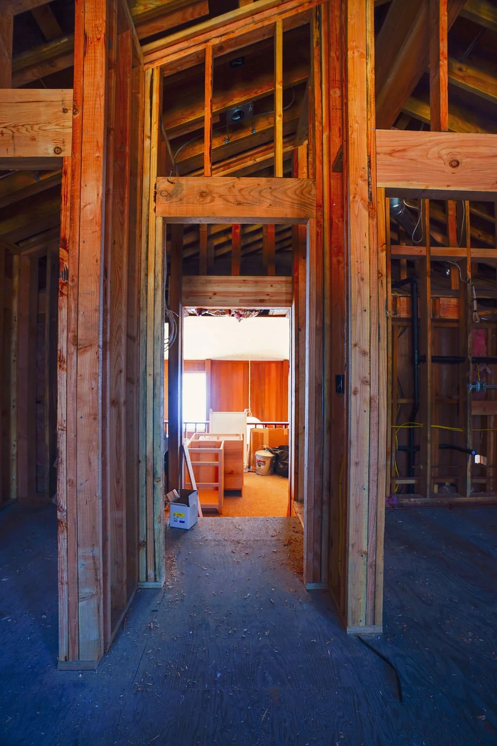 framed addition looking through door to original house