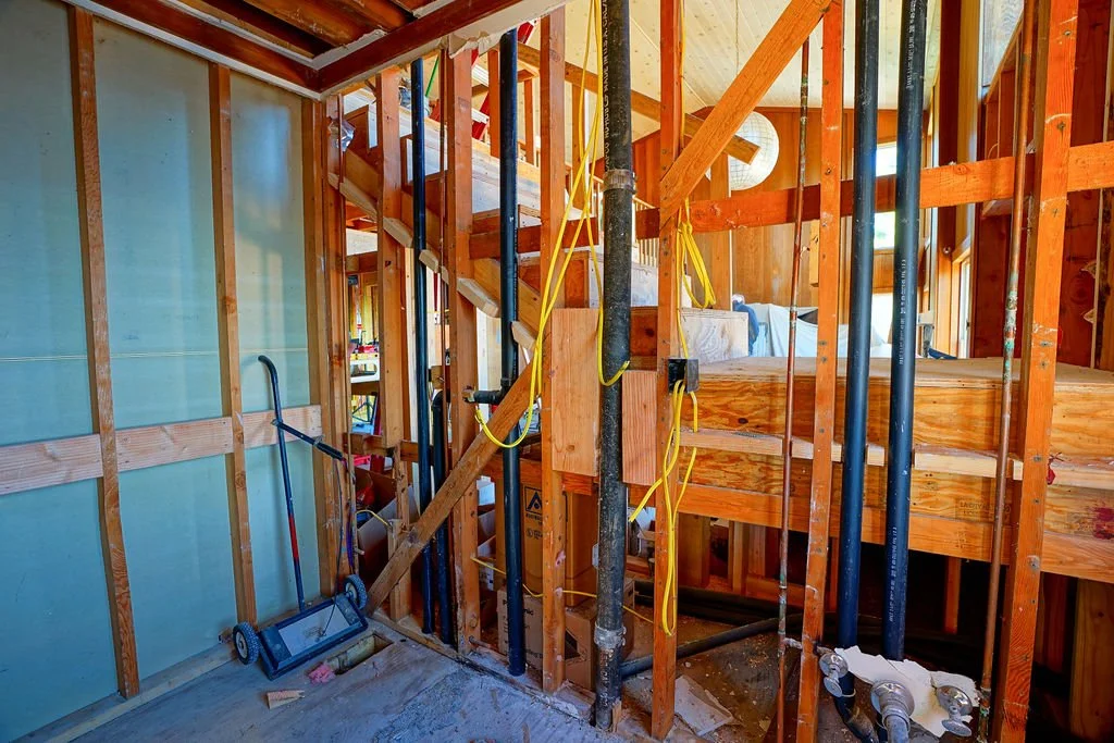interior framing looking through wall to stairs