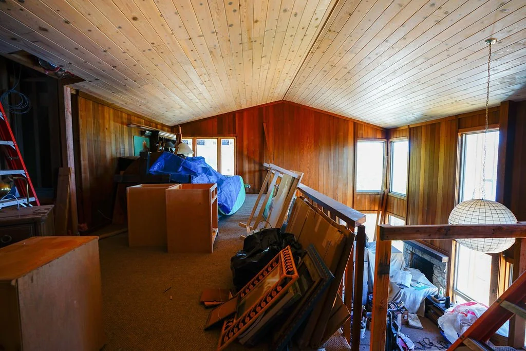 loft view of faux wood siding in large room