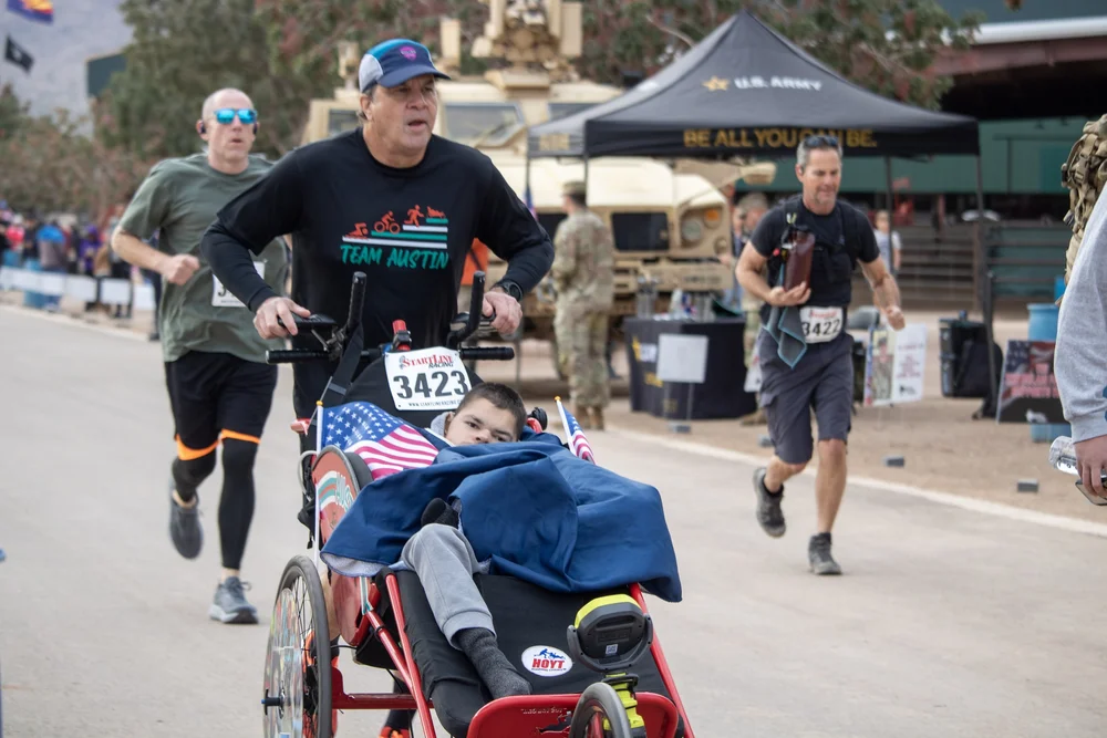 Participants sharing a race-day moment at Ruck 4 Freedom