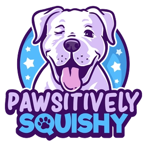 A cartoon illustration of a happy dog with a playful expression, surrounded by a blue background with white stars, with the text 'Pawsitively Squishy' below.