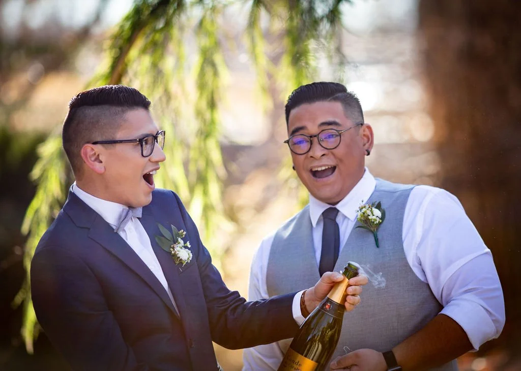 gay couple champagne wedding reno