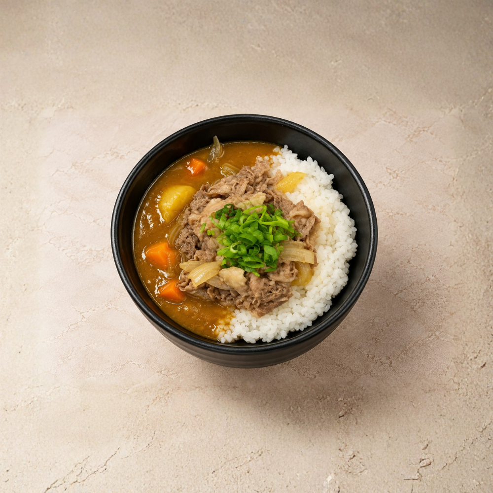 Our house-made Japanese curry poured over Gyudon, creating a deep, rich flavor. A comforting and satisfying option for any meal.