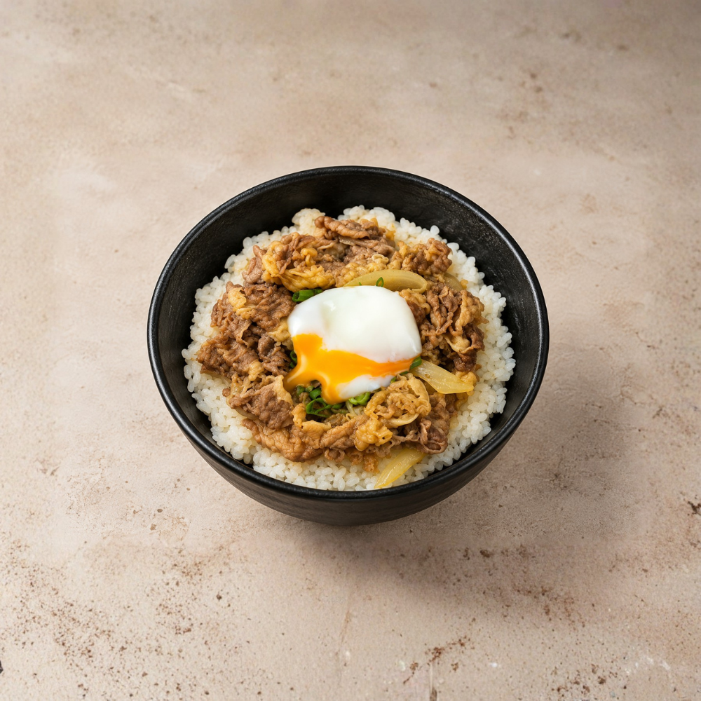 Our signature Gyudon, topped with a silky onsen egg. Slow-simmered beef, perfect rice, and rich umami make this a must-try for lunch or dinner.