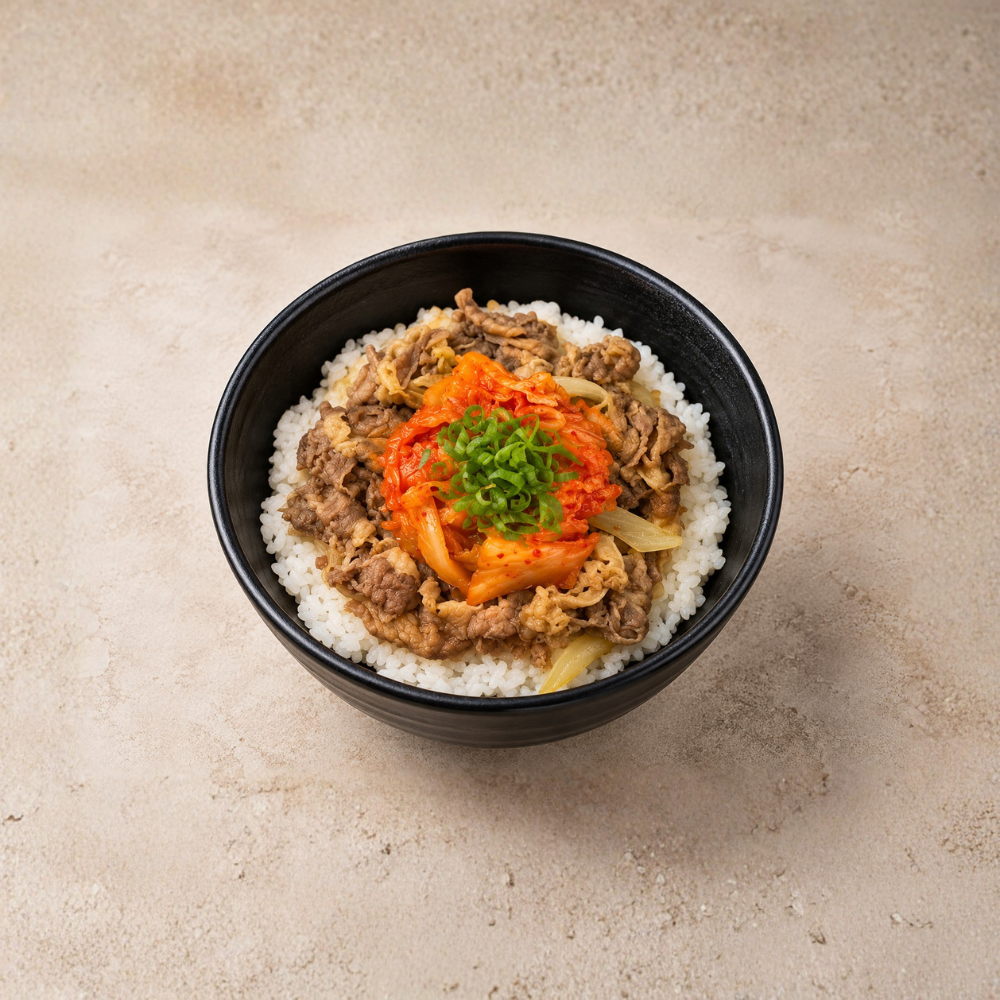 Gyudon with spicy, tangy kimchi for a bold, flavorful twist. The perfect mix of heat and umami, available for lunch or dinner.