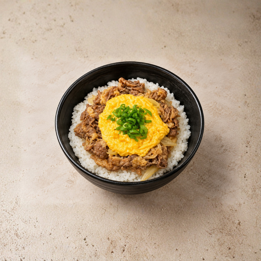 Classic Gyudon with melted cheese for extra richness. Tender beef, savory sauce, and creamy texture—an indulgent option for lunch or dinner.