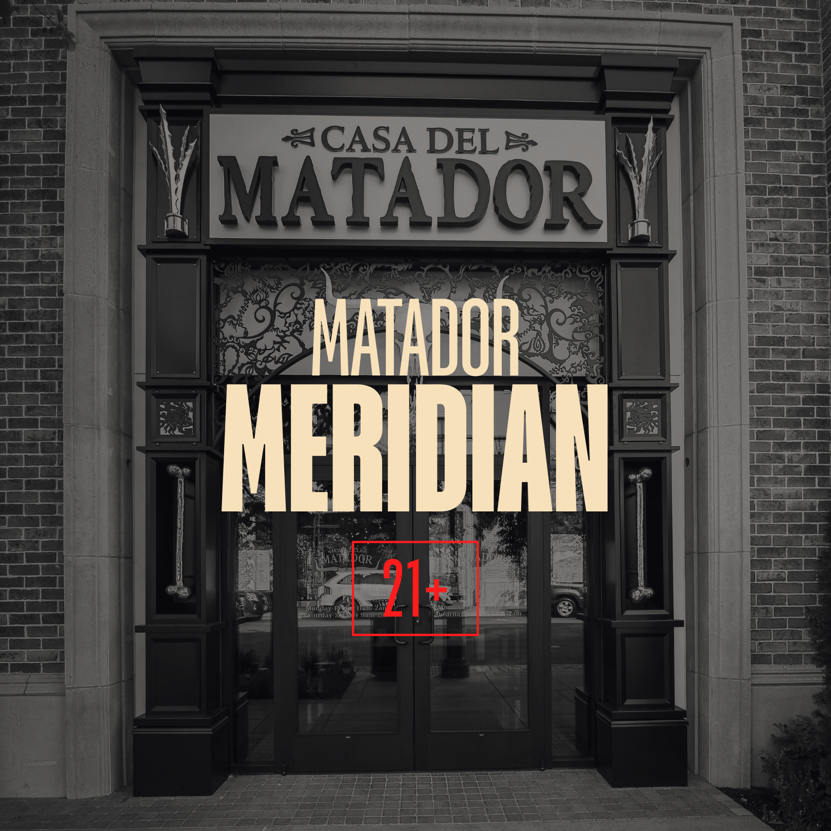 The storefront of Casa del Matador Meridian, showing a black door and window, with signage above and a large overlay text in the foreground reading 'Matador Meridian' and a red '21+' symbol. The building has brick and stone architecture.