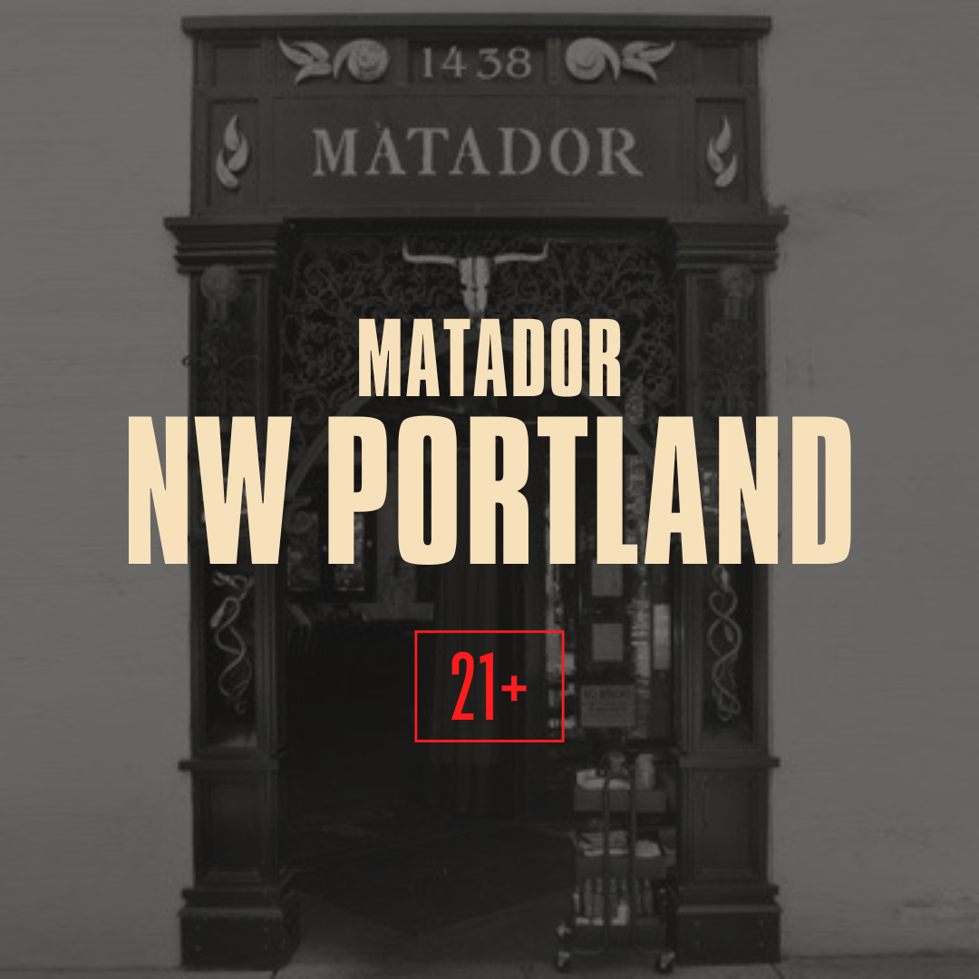 Black door with ornate frame and the word 'Matador' above it, located at NW Portland. Age restriction 21+.