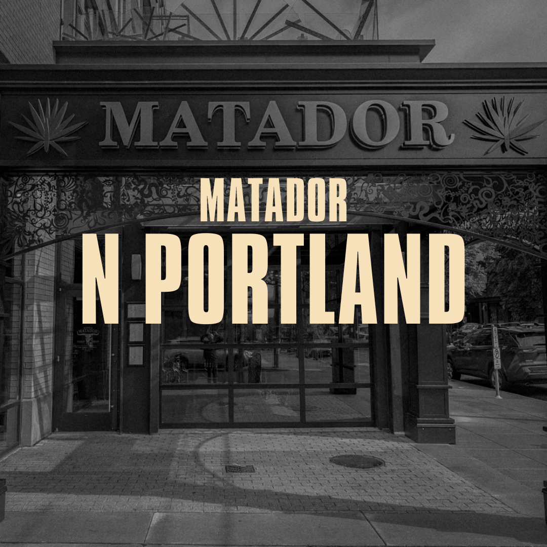 Black and white photo of a building entrance with 'MATADOR' sign and decorative metalwork, overlaid with text 'MATADOR N PORTLAND' in bold beige letters