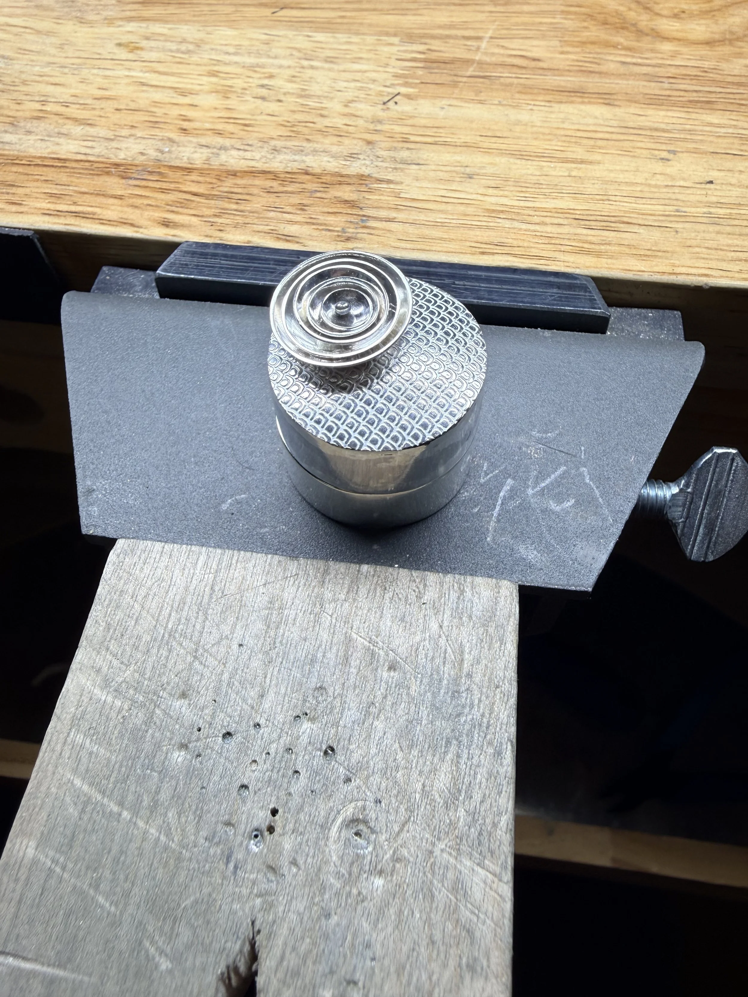 Sterling Silver trinket box (aka snuff box). Textured cap top, concentric sterling silver domes riveted for movement. 