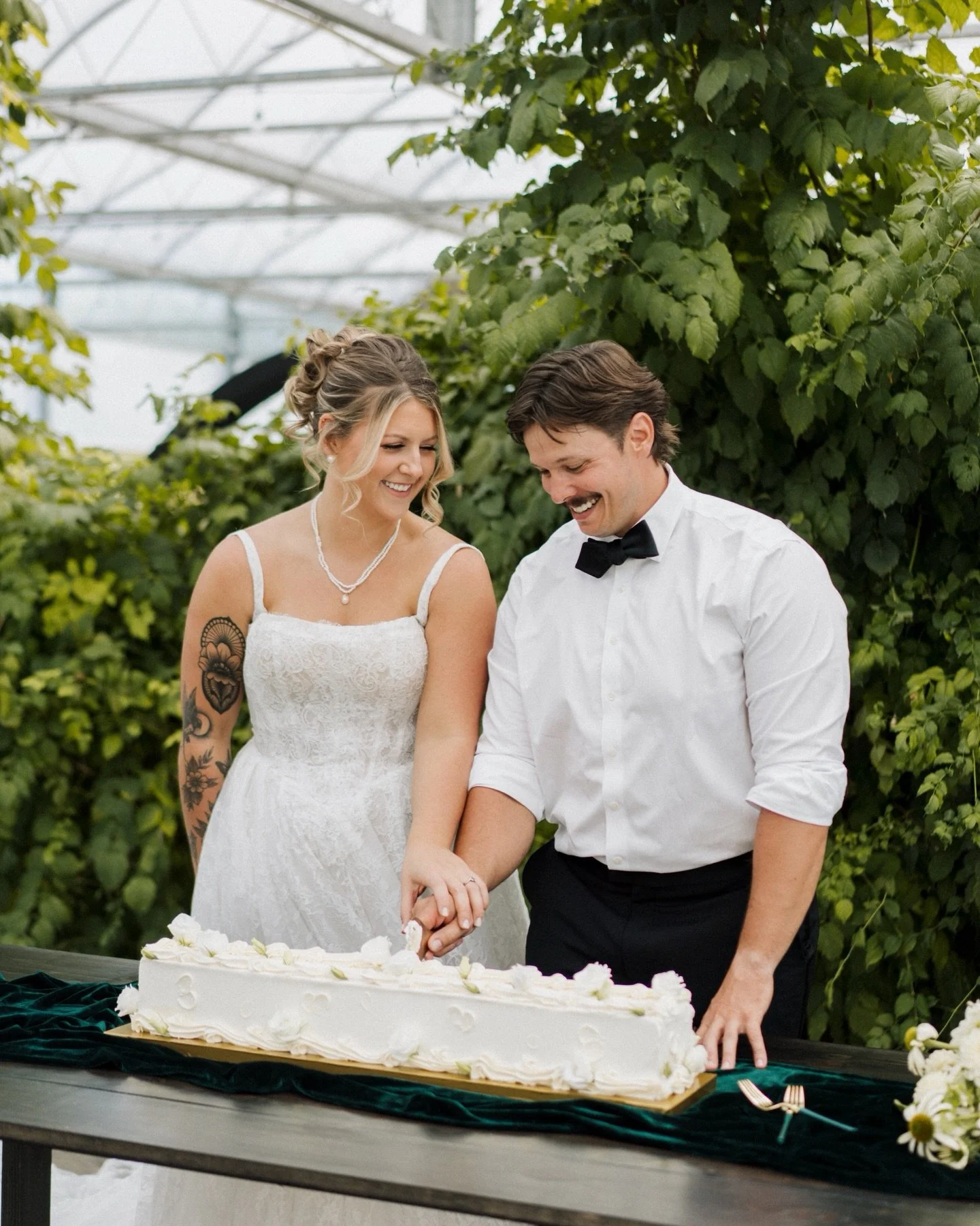 How fun is this runner cake?! 🥰 

@prettysweetsbykenna truly outdid herself, and I&rsquo;m so grateful I got to capture her masterpiece alongside these two lovebirds at @eventsatcreekside.mi 💚 This day was definitely one of my favorite memories fro
