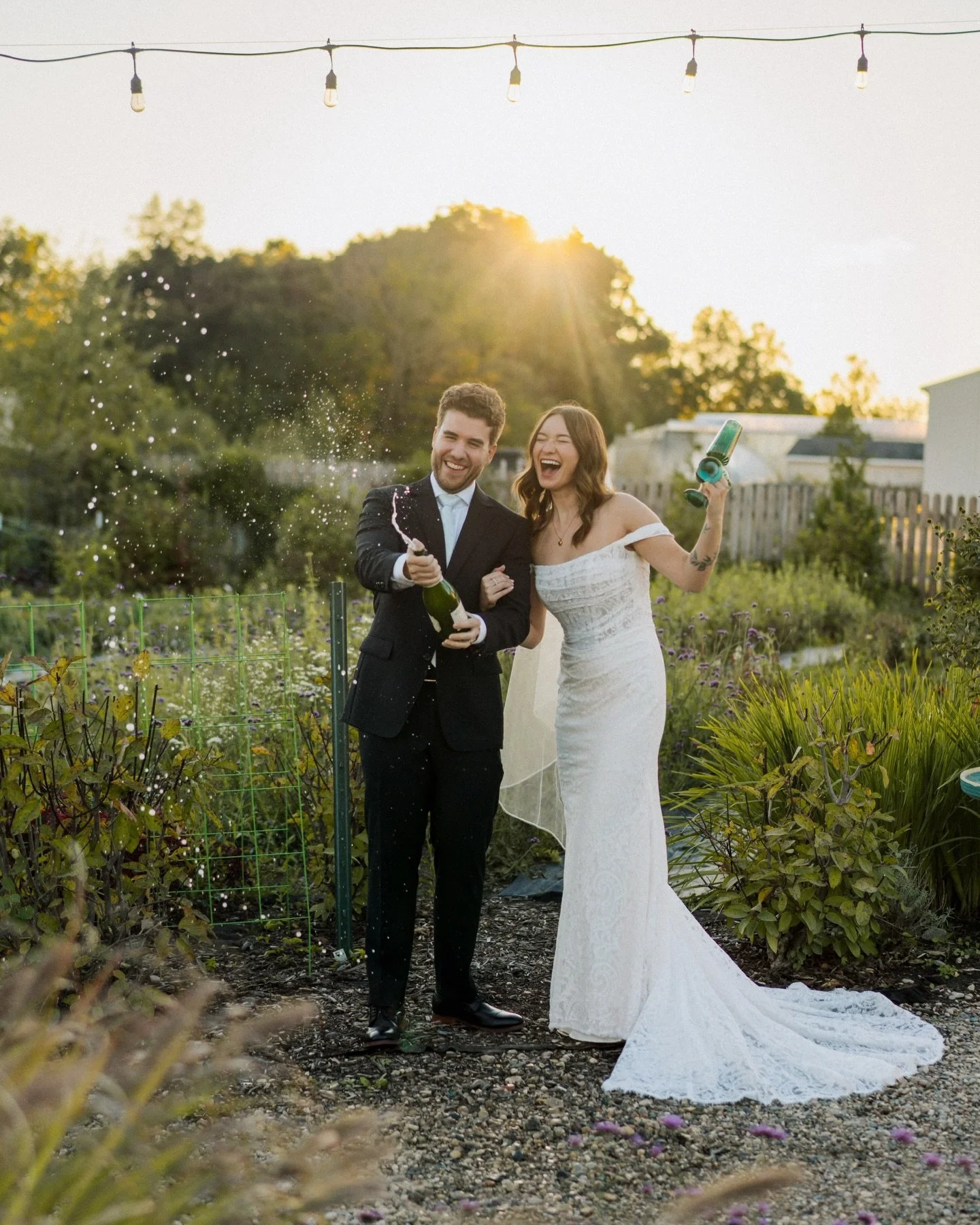 Golden hour hits different at @eventsatcreekside.mi ✨🥂

The celebratory champagne spray is a 10/10 way to end the night. Highly recommend wrapping every wedding day in sunshine and bubbles.

@hollykellnelson &amp; Josh- thank you for being your ador