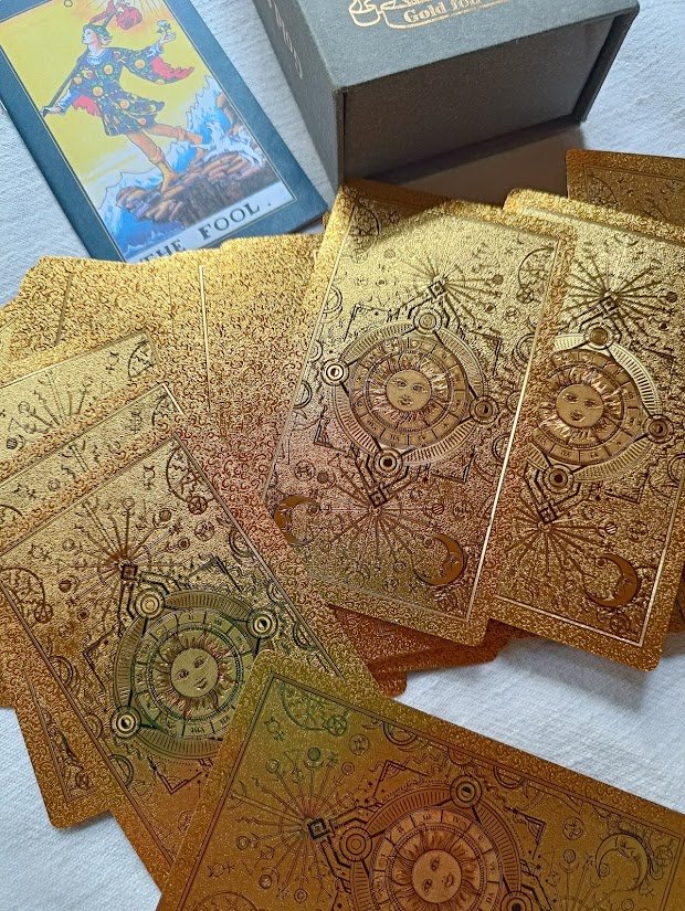 Gold Foil Tarot cards spread out face down