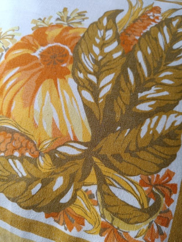 Harvest print up close, showing squash and corn