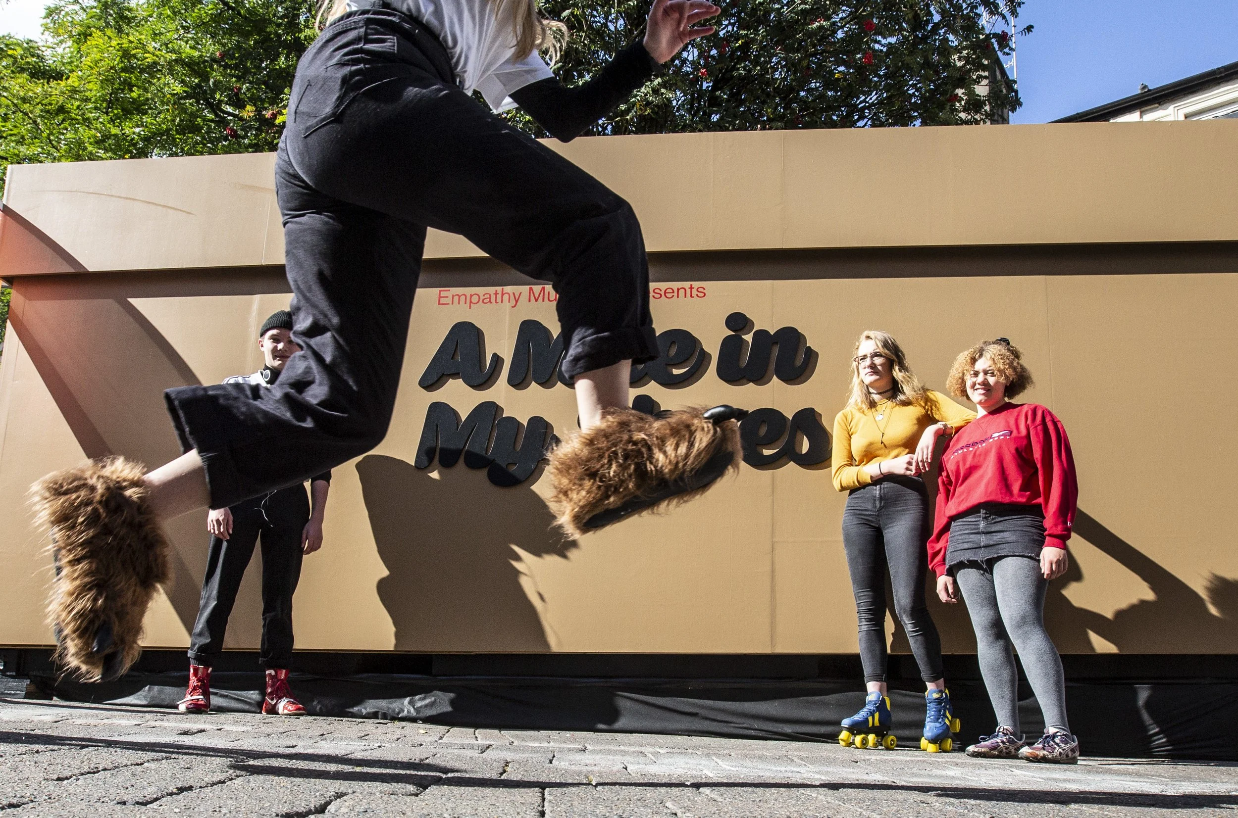 A New Interactive Art Exhibit Lets You Literally Walk a Mile in Someone Else’s Shoes