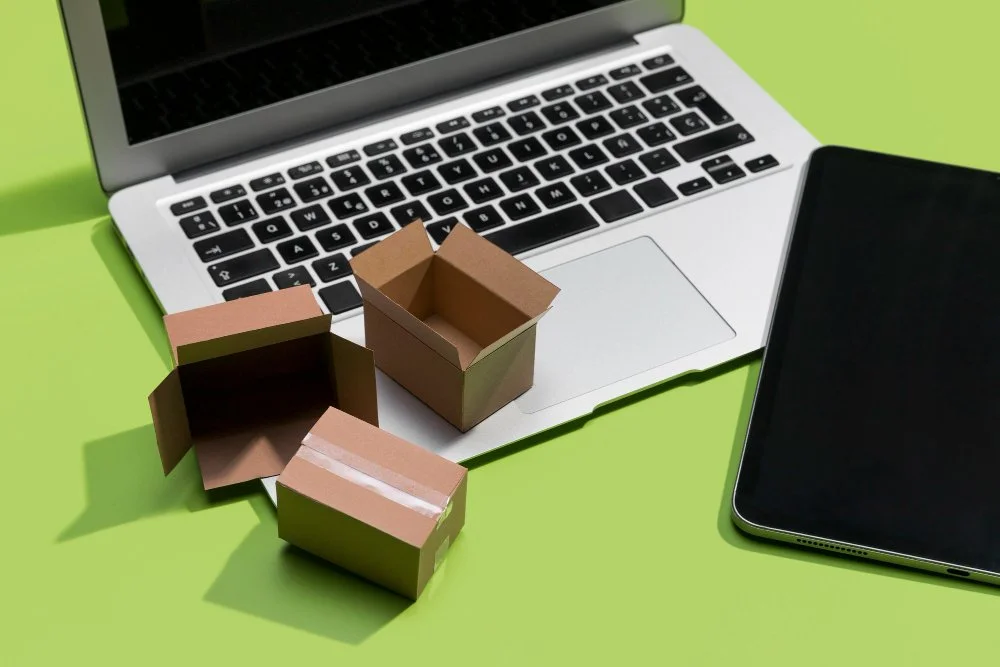 Stacked shipping boxes labeled for Amazon FBA prep, ready for LTL freight pickup via Partner Carrier logistics service.