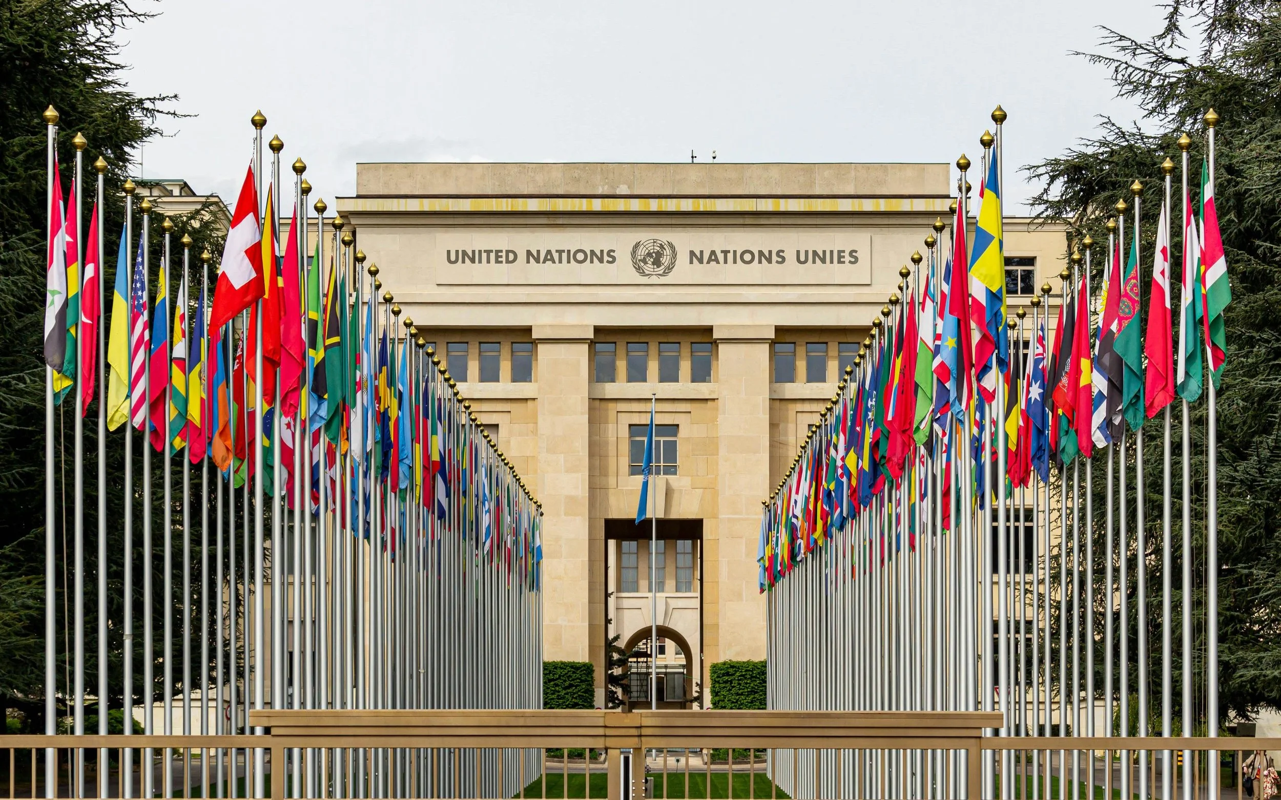 United Nations Building in Vienna flanked by many flags on both sides