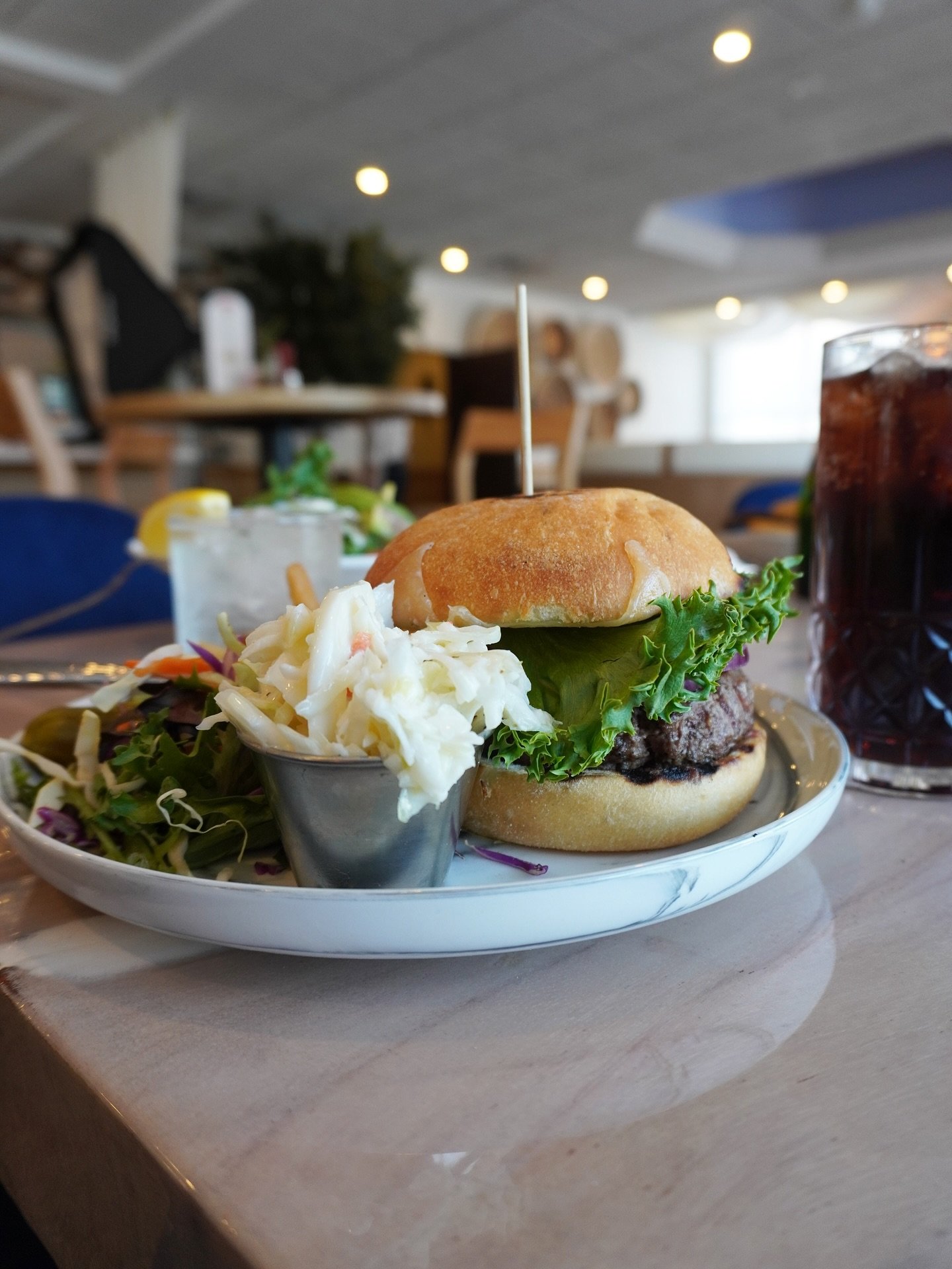 Burgers done right 🍔 Juicy, fresh, and stacked with flavor&mdash;this is what lunch should look like

🔗 Tap the link in our bio to book your table

#AmericanaEatery #GreatNeckEats #BurgerGoals #NowOpen #LunchVibes