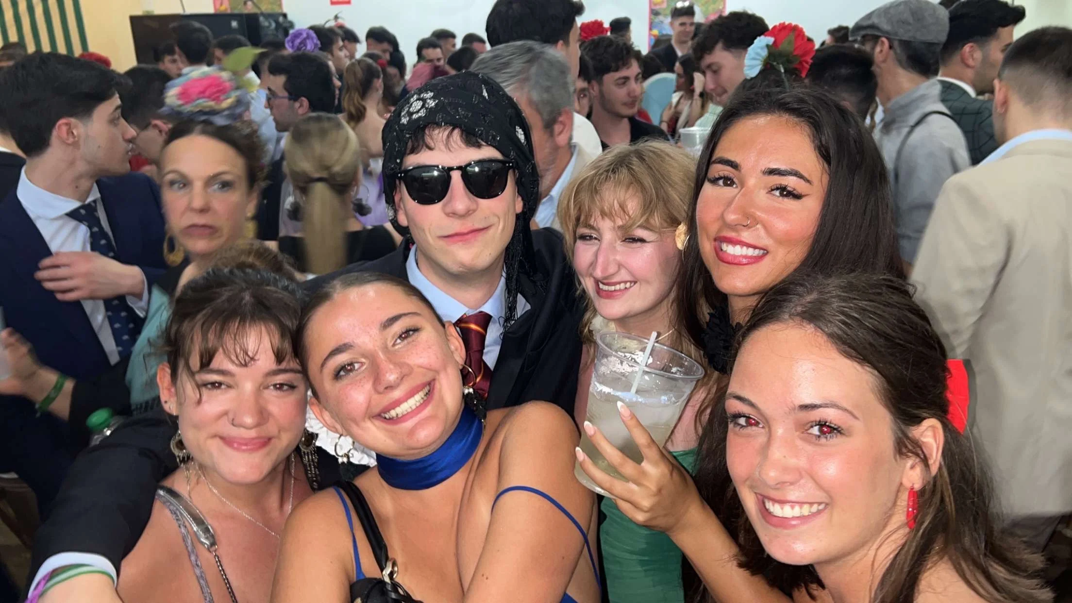 Friends having fun at Feria de Abril in Sevilla, Spain.