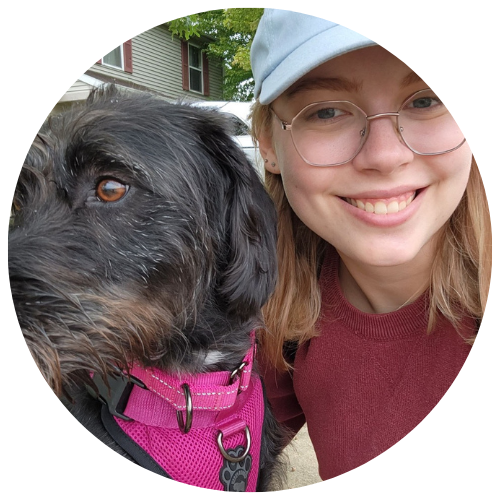 Selfie of Walk Your Doggo pet caretaker and brown dog with pink harness.