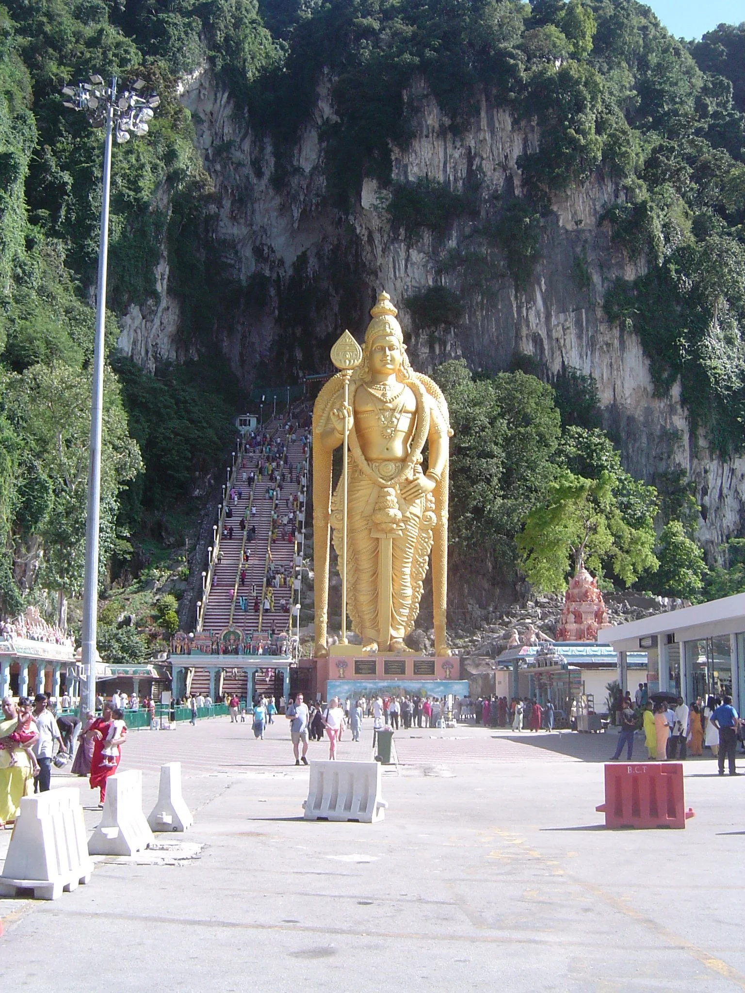 Buddha guarding the entrance to the Batu Cave