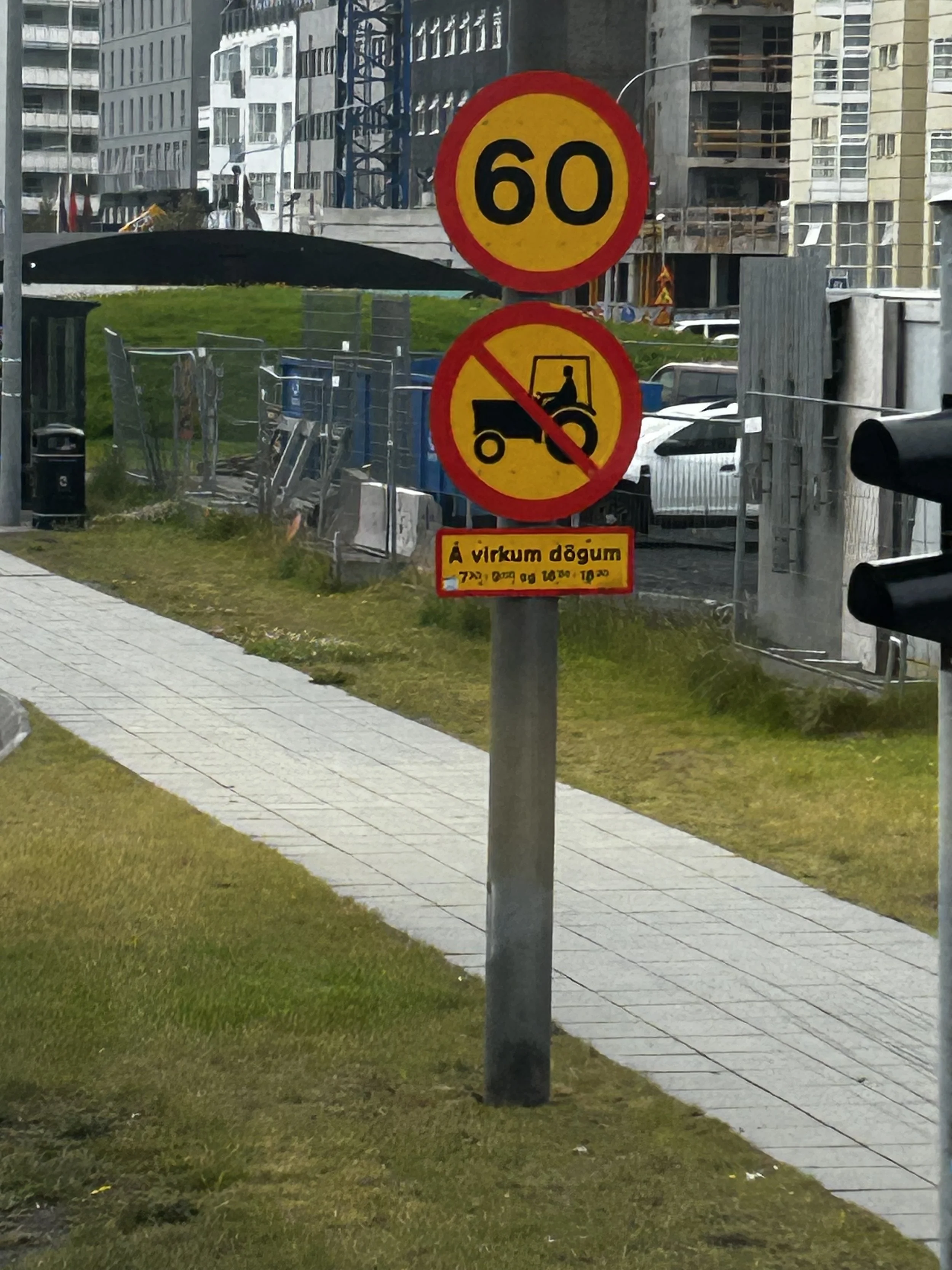 Reykjavik sign - words translate to "on weekdays," so you can drive a tractor in Reykjavik on weekends... (Copy)