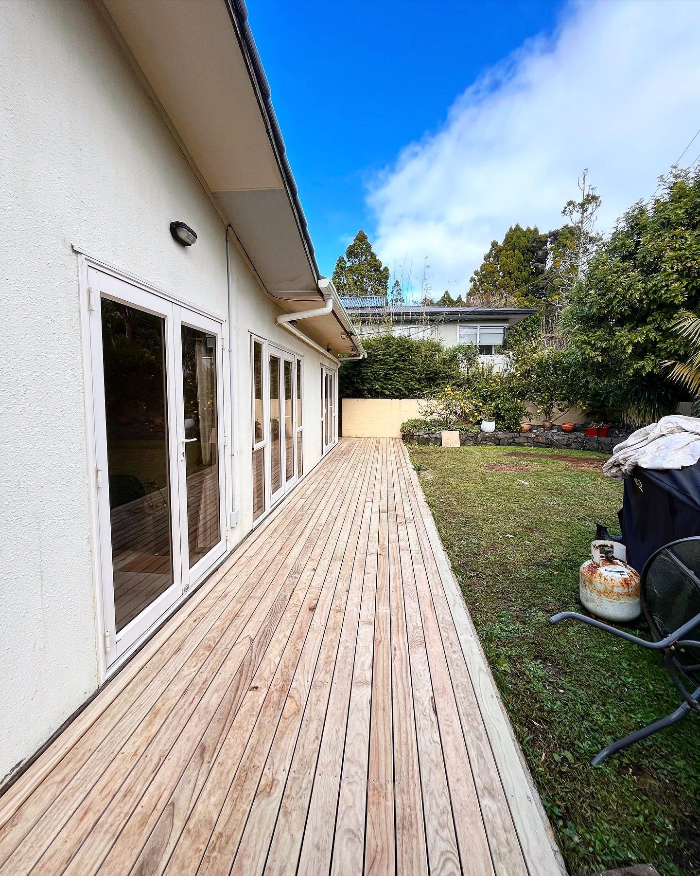 (Swipe right for before pictures)

Here is a deck we rebuilt recently. Unfortunately the previous builder had done some dodgy work. This had caused water to enter the building and the deck to rott prematurely. We installed a moisture barrier, fixed t
