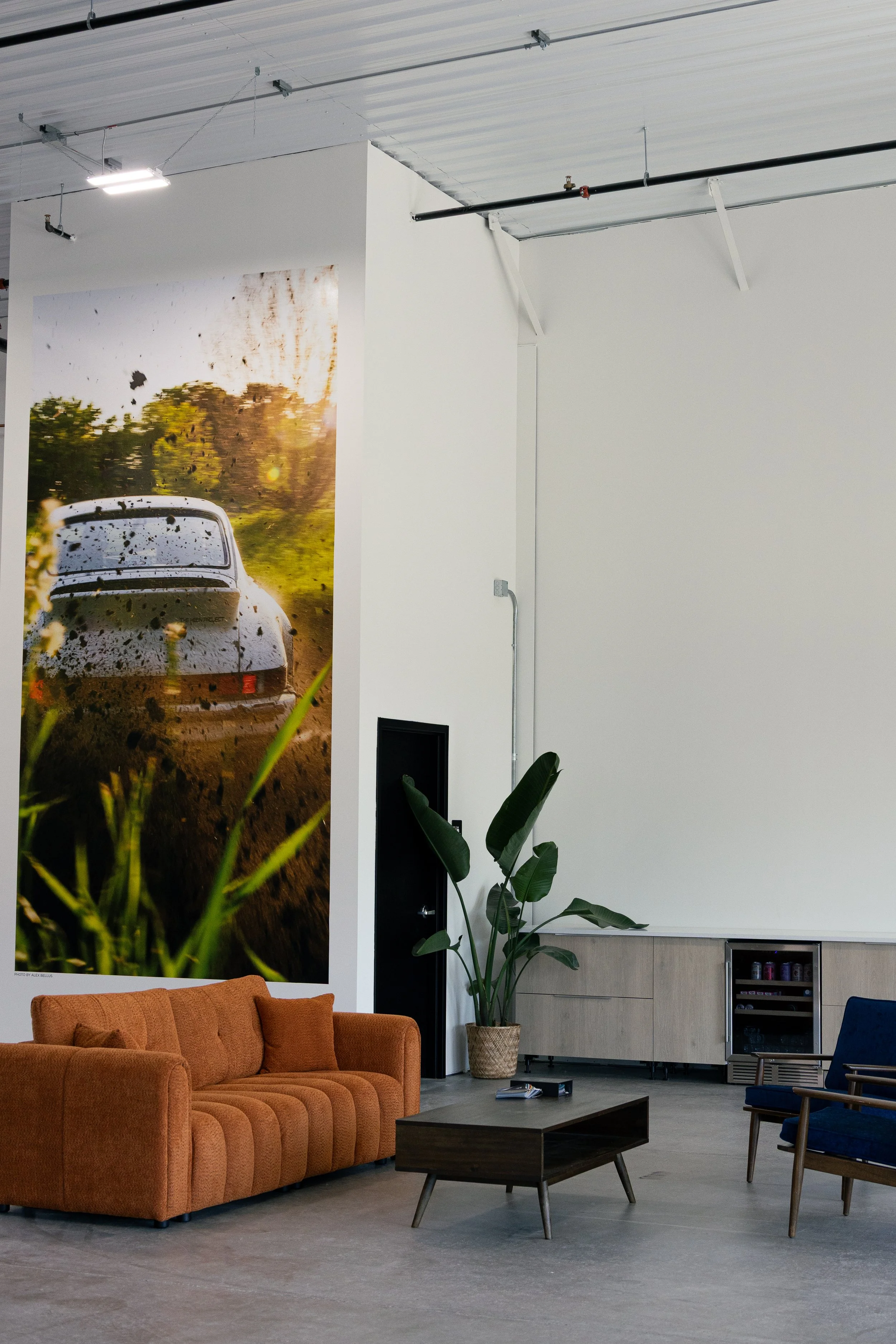 Interior of Plugs Garage, automotive shop specializing in paint protection film, commercial vehicle wraps, and automotive window tint.