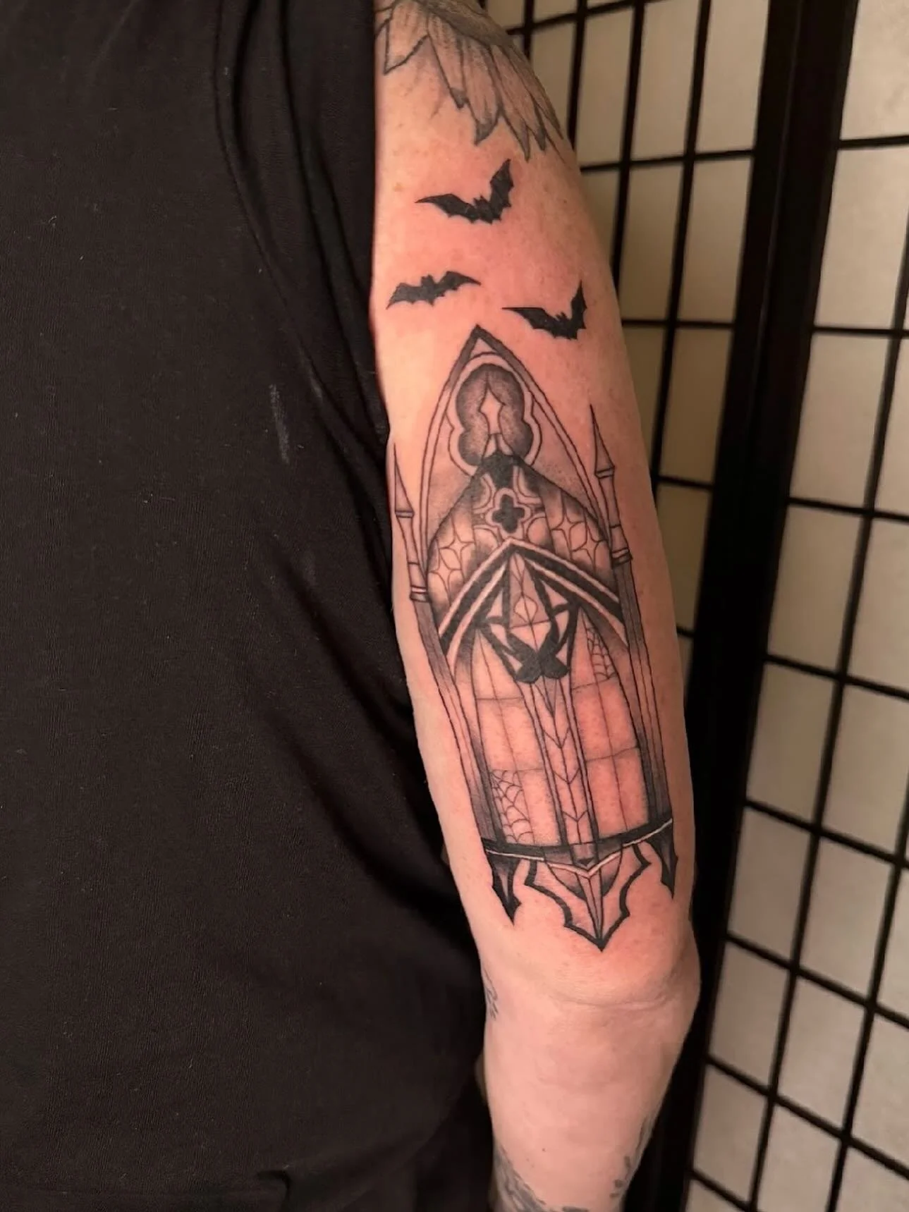 Gorgeous gothic window by @maisentattoo 🦇  A little patience and a lot of detail went into this one, about 4.5 hours start to finish. Maisen&rsquo;s been turning out some seriously clean, thoughtful pieces lately. She&rsquo;s booking new clients and