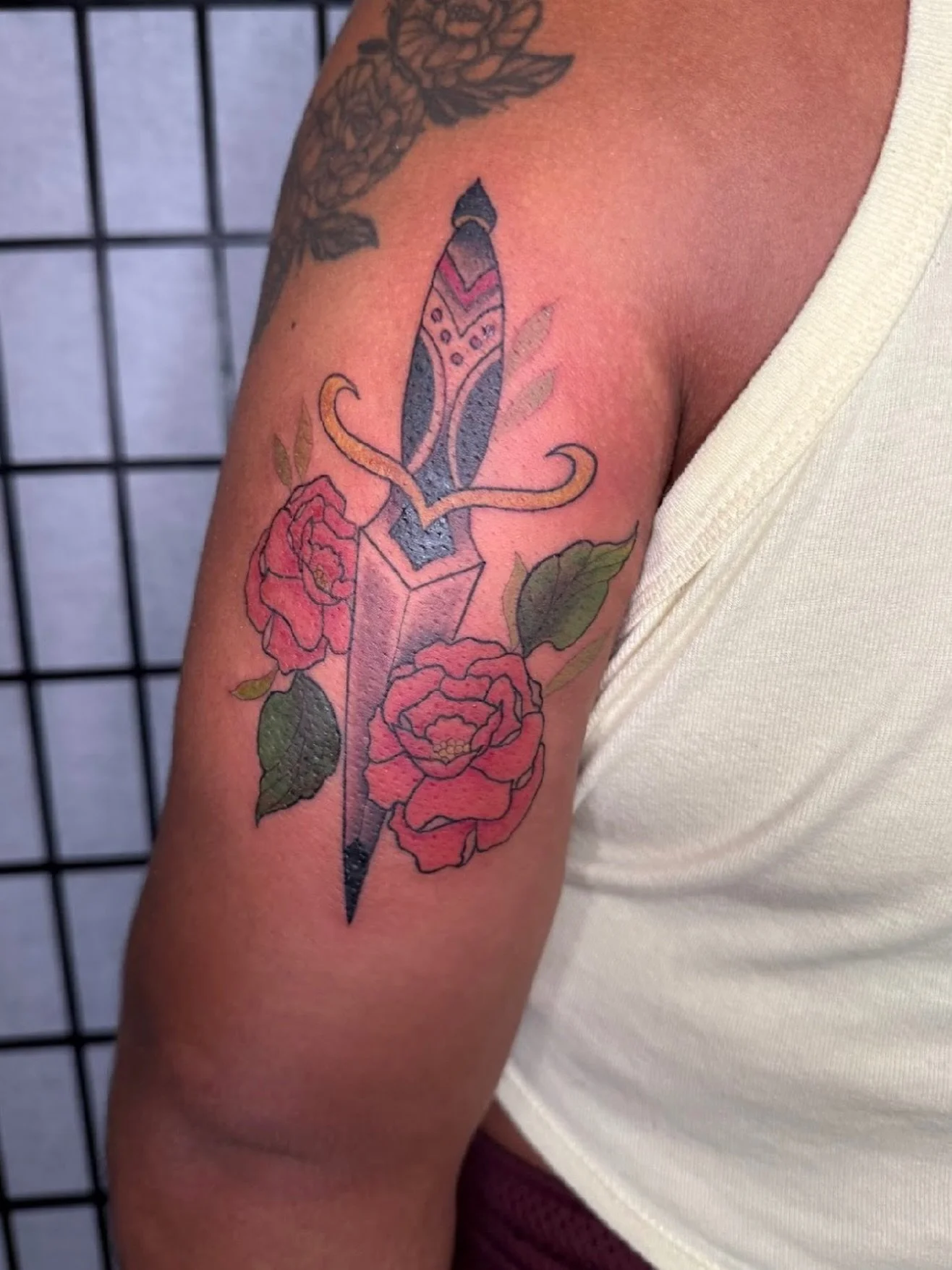 Trad dagger by @maisentattoo 🗡️🌸 Classic design and crisp lines. Maisen has been loving these timeless pieces. Message us or stop by Juniper to snag a spot with her! 🙌🏻
