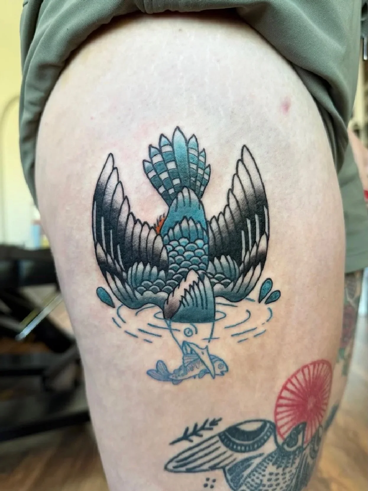 Artist: @charliedarling_tattoo Caught mid-dive 🐟✨ we absolutely love this bold, splashy moment with clean lines and cool tones. Check out Charlie&rsquo;s page follow for fun or book a tattoo! #traditional #tattoos #artist #junipertattoo #centralpoin