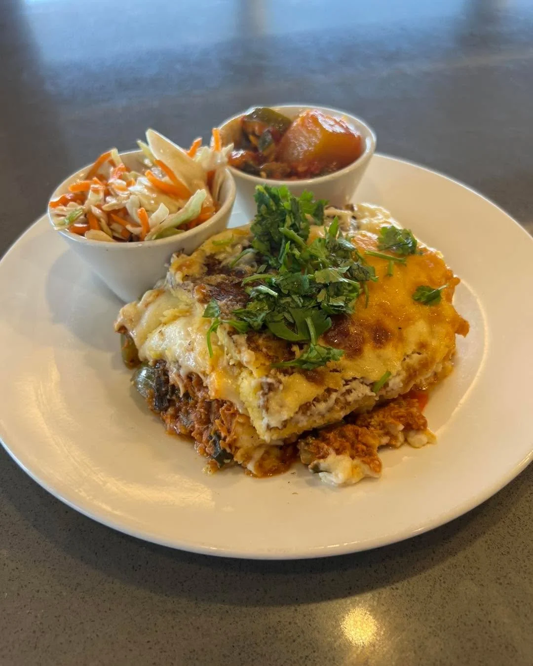 Saturday 9/27! This week&rsquo;s culinary adventure continues with Luis &amp; Maria&rsquo;s Venezuelan food! Just look at this delicious Venezuelan Chicken Chalupa: layers of sweet corn pancakes (cachapas), tender shredded chicken, and creamy b&eacut
