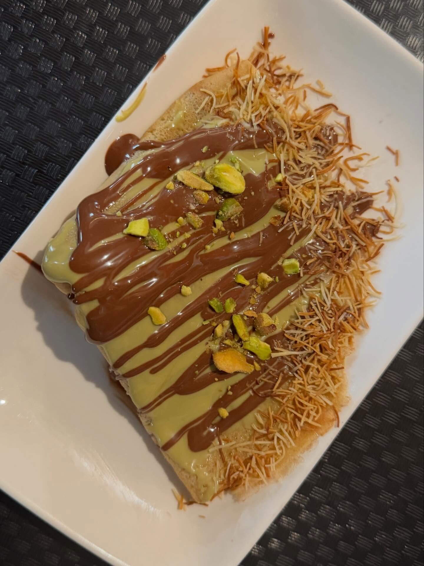 Sweet cravings calling? 🤎 Swing by for the must-try Dubai Chocolate Cr&ecirc;pe by Chef Rabah, rich, indulgent, and absolutely unforgettable! Open until 8pm.