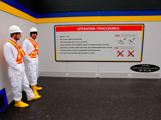 Two enthusiastic NT employees taking a breather from their nacho supercomputer duties.&nbsp;