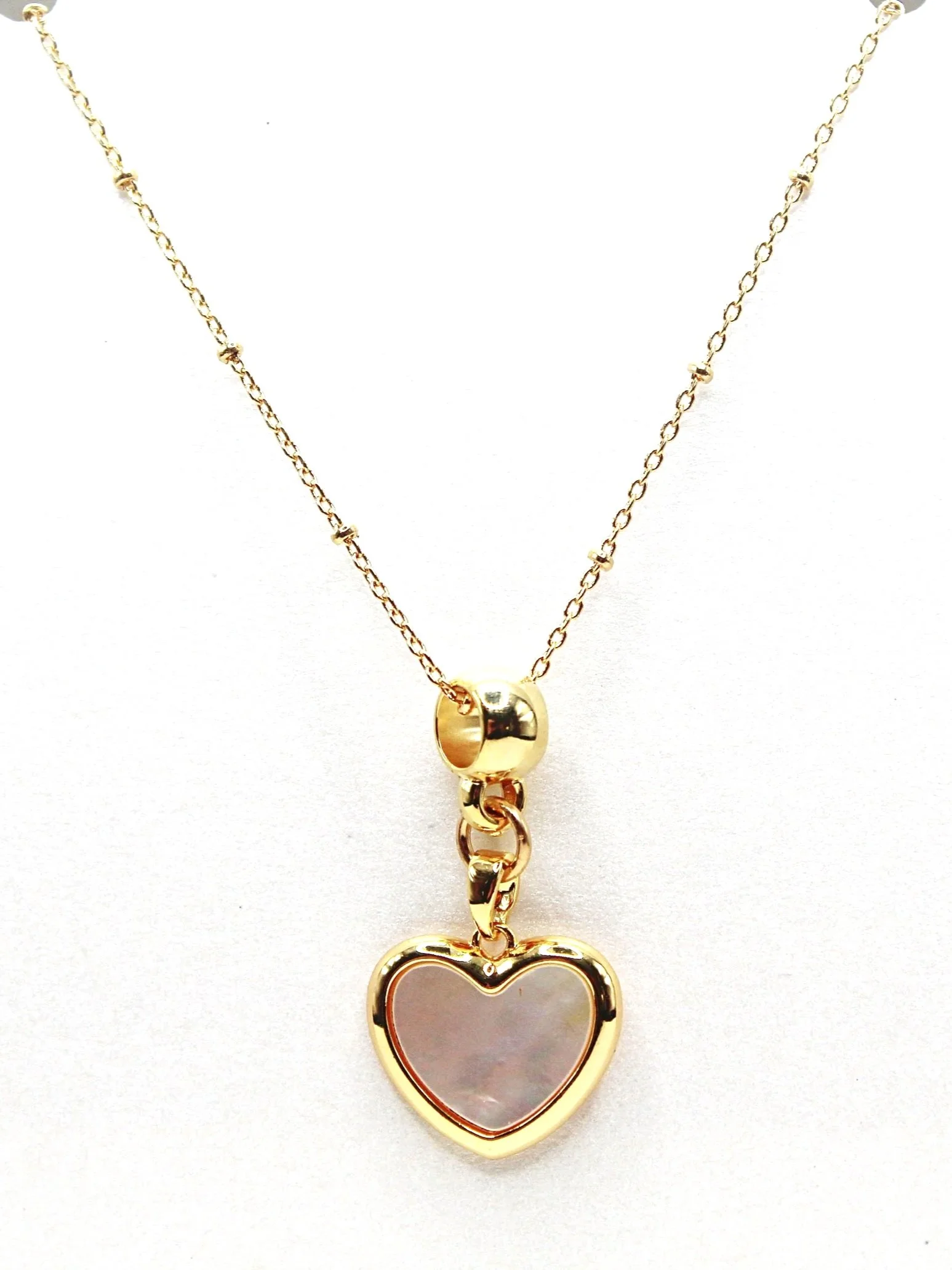 Sonji-Gem-Designs-Simmering-Heartstrings-Necklace.jpg