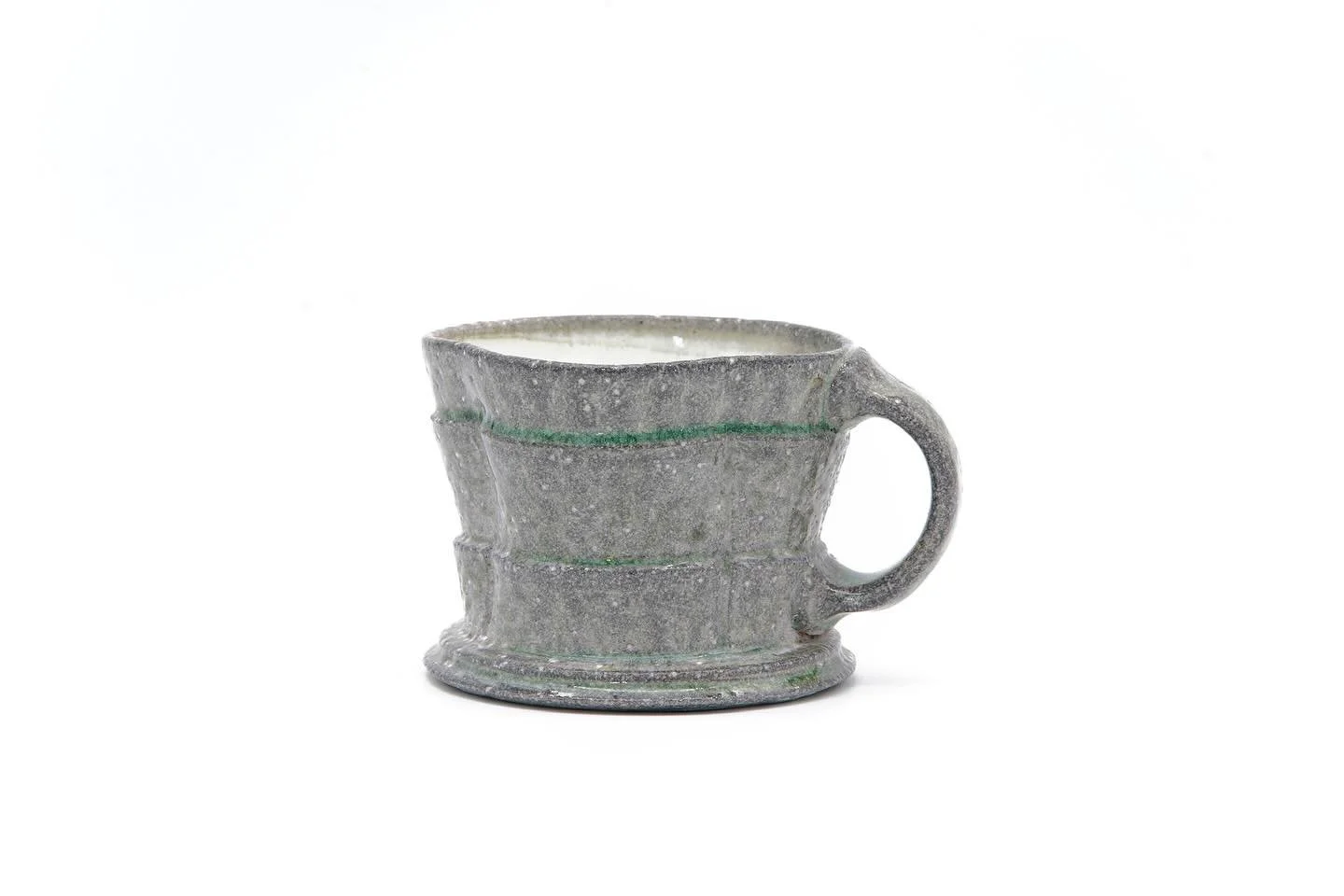 Heres another mug with the ridge detail that&rsquo;s been soda fired! This mug came out great and I really enjoy the shorter style with a wider body. 
&bull;
&bull;
&bull;
#clay #pottery #ceramics #art #MadeInMN #KaiBriskPottery #MNpottery #MNartist