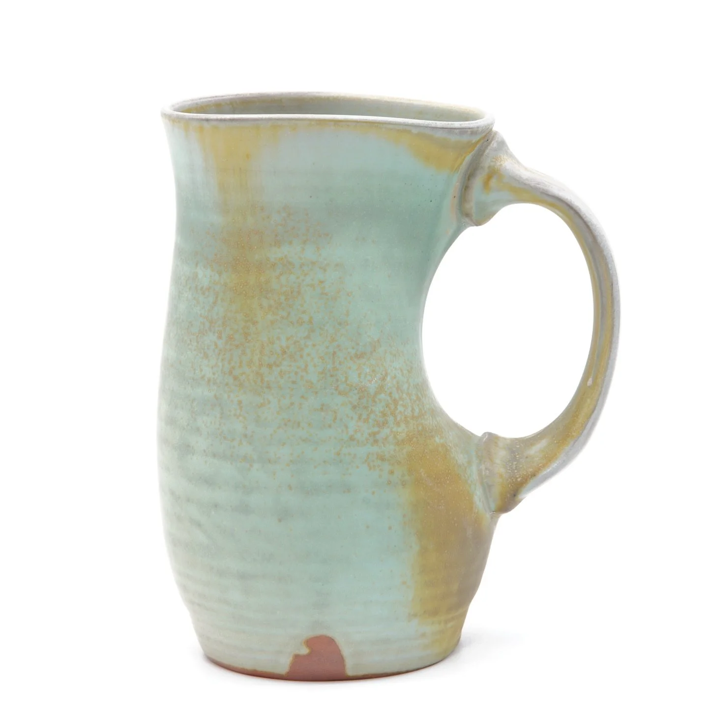 🪵🔥Wood-Fired Mug. Another darting experiment, much better handle proportion on this form.  Tried an Oribe and turned out rather well, love the transition of greens to tan.  What do you think?
#woodfire #woodfirepottery #functional #ceramics #potter