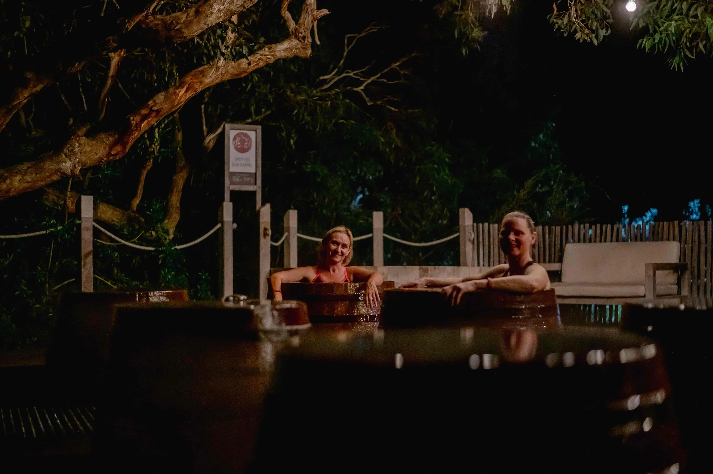 Two people bathing at Hilltop Escarpment at twilight