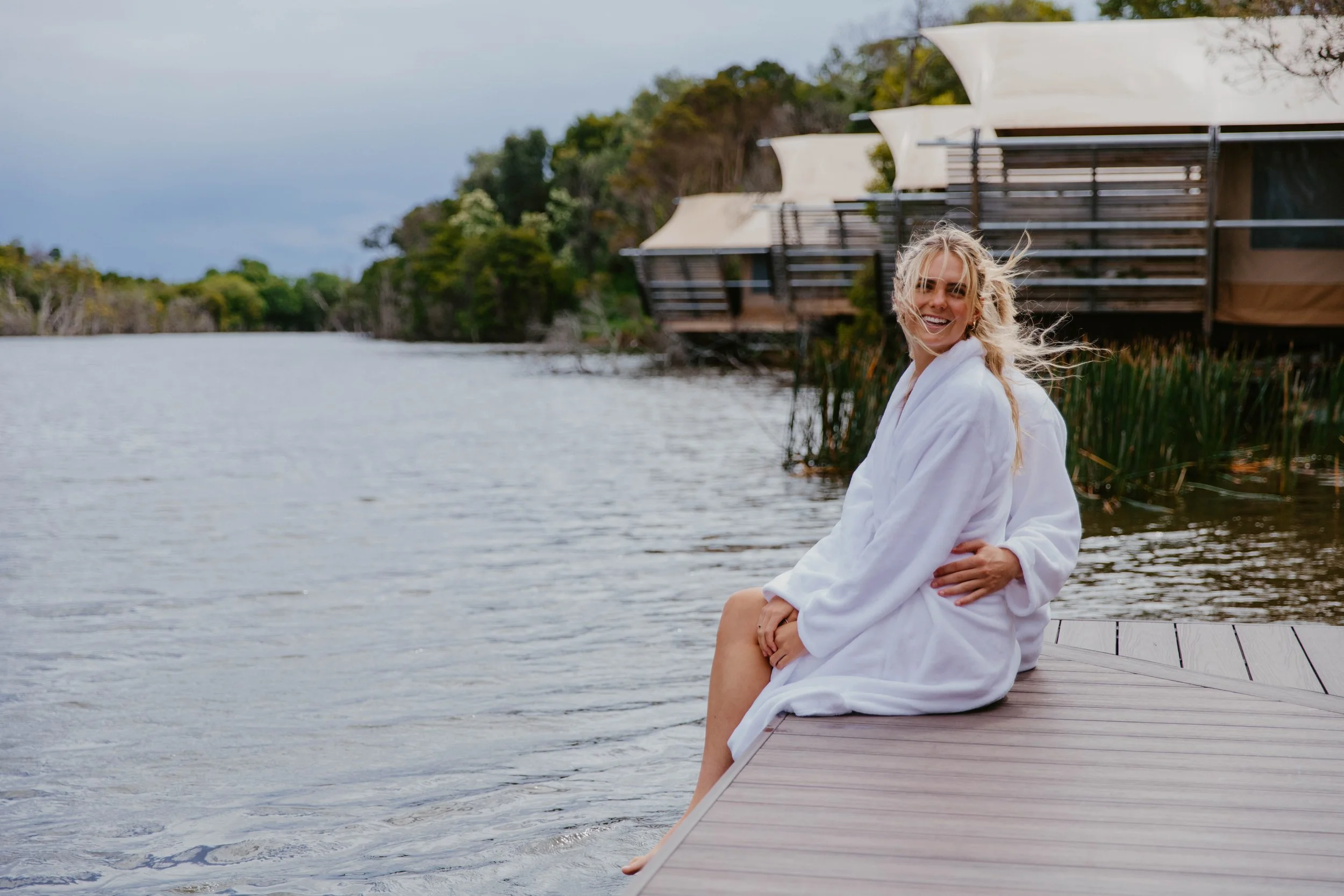 A couple sitting on the floating sauna