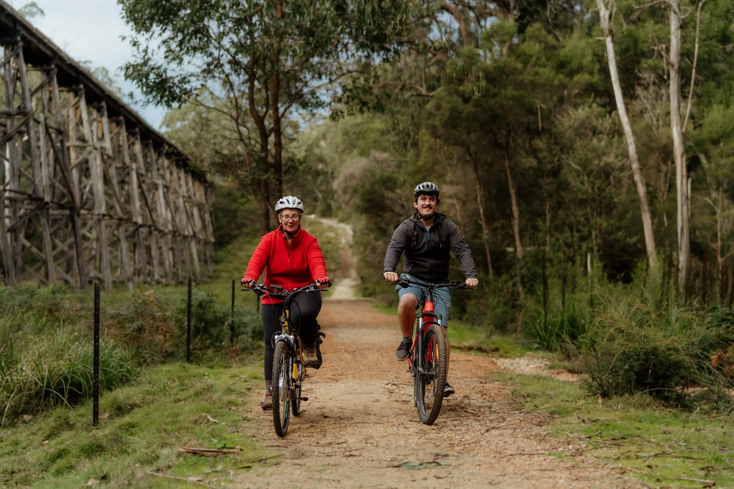 Two people cycling