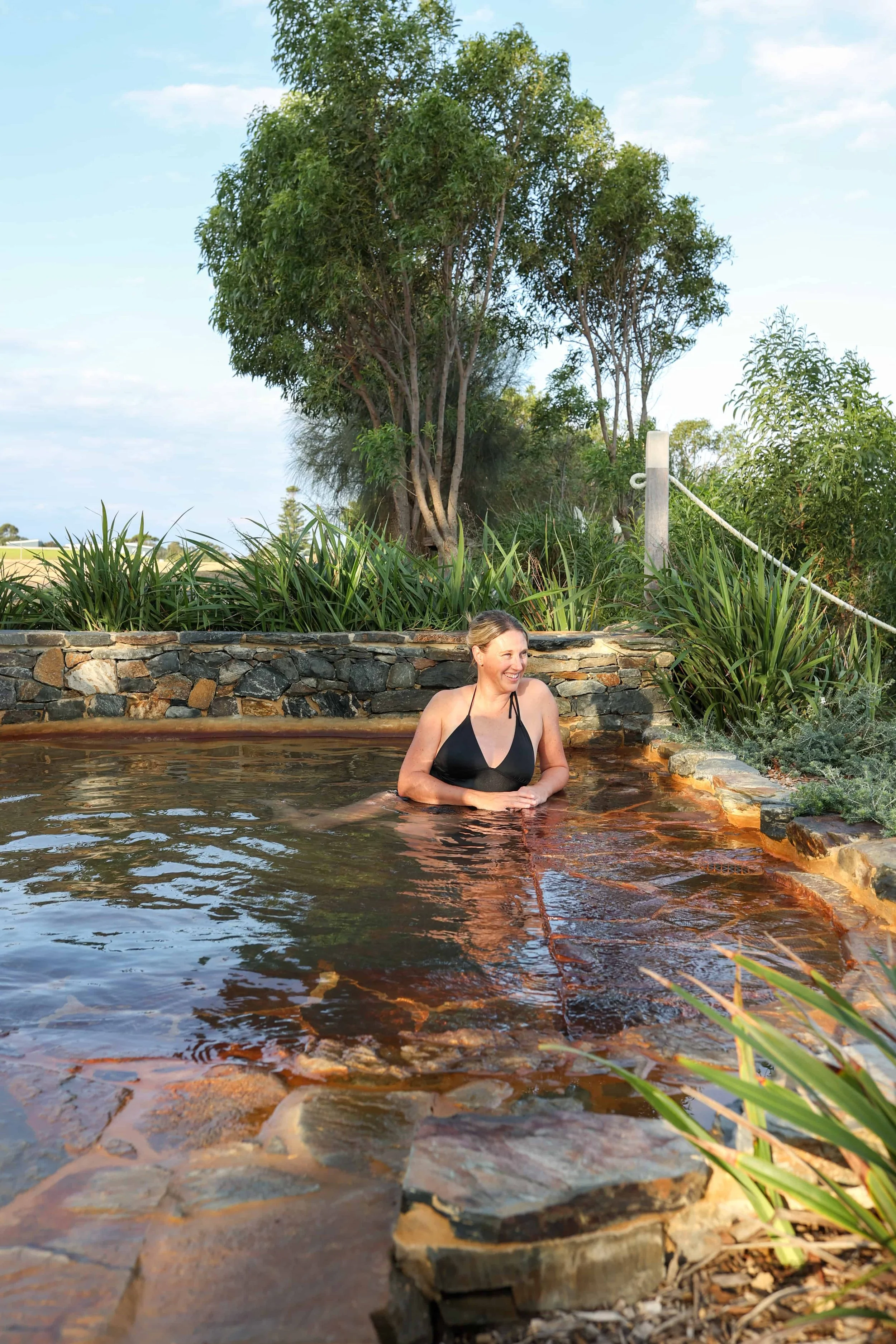A woman bathing in the Hilltop Escarpement