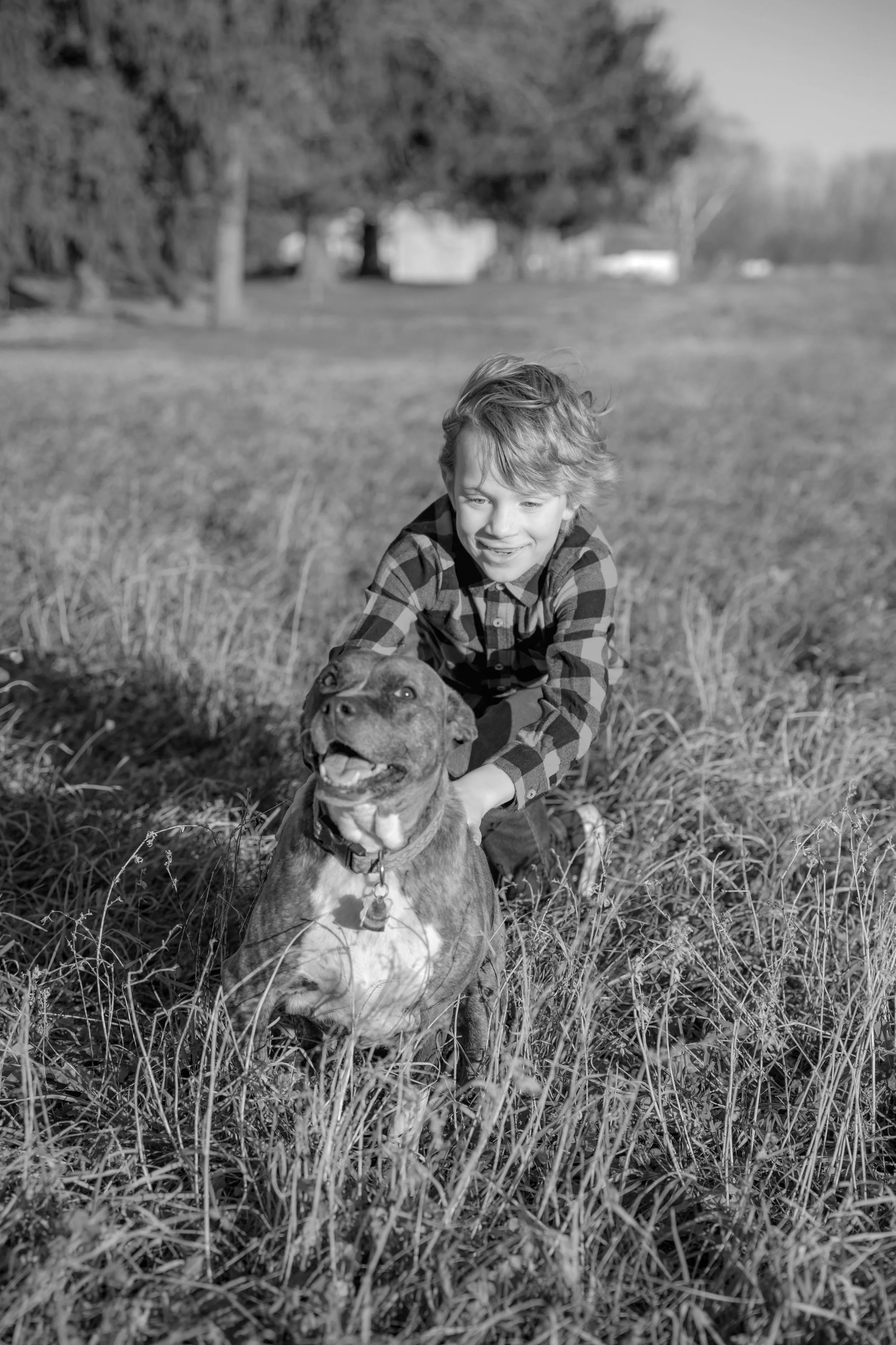 Picture of a boy with his dog