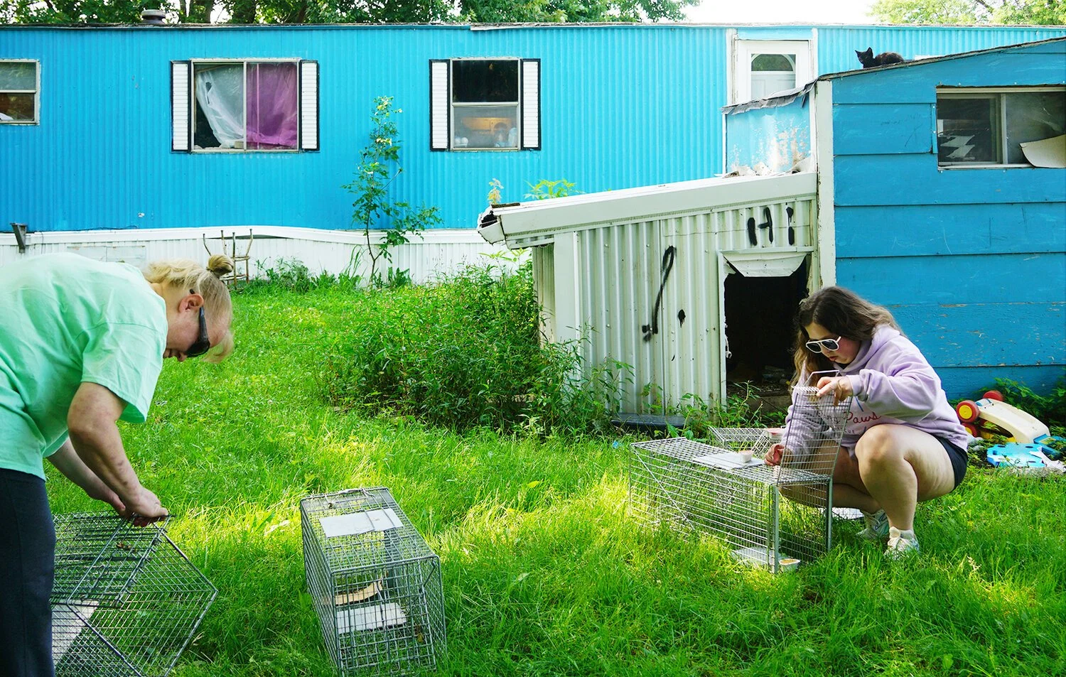 CPR members Kim Schimmer (left) and Hailey Reimers (right) trap community cats for trap, neuter, and return (TNR)!