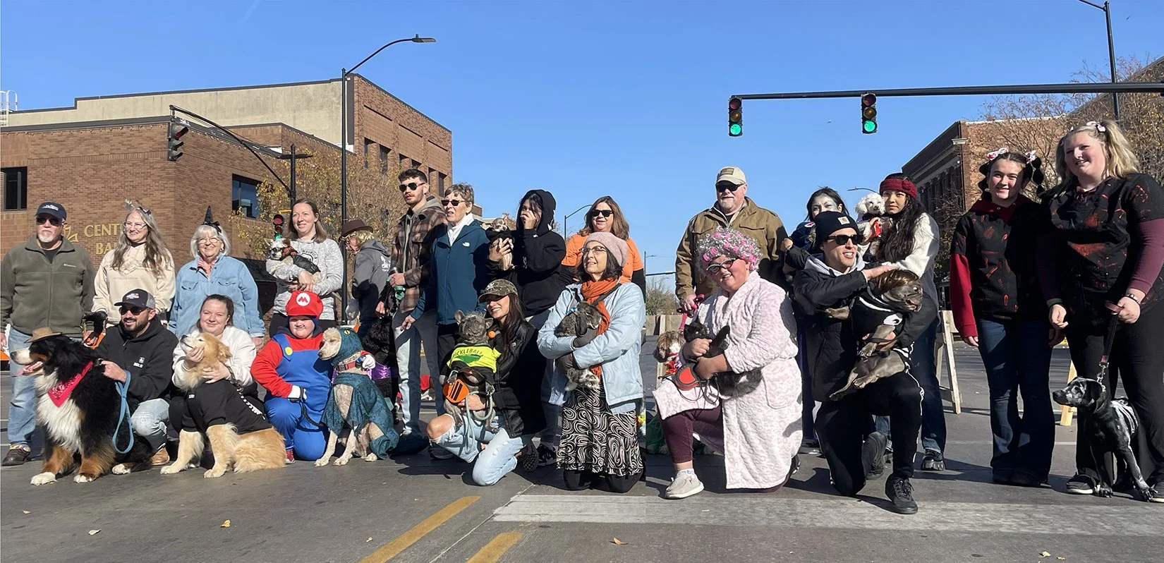 Caring Paws and community members at Chills and Thrills! CPR hosts a pet costume contest every year!
