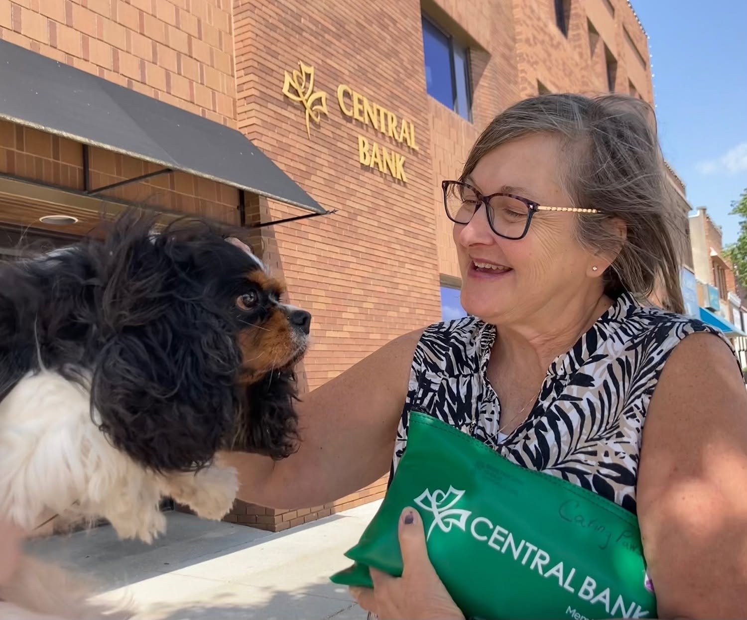 CPR mascot pup Dolly and treasurer Beth discuss money raised at the Roundup event and auction!