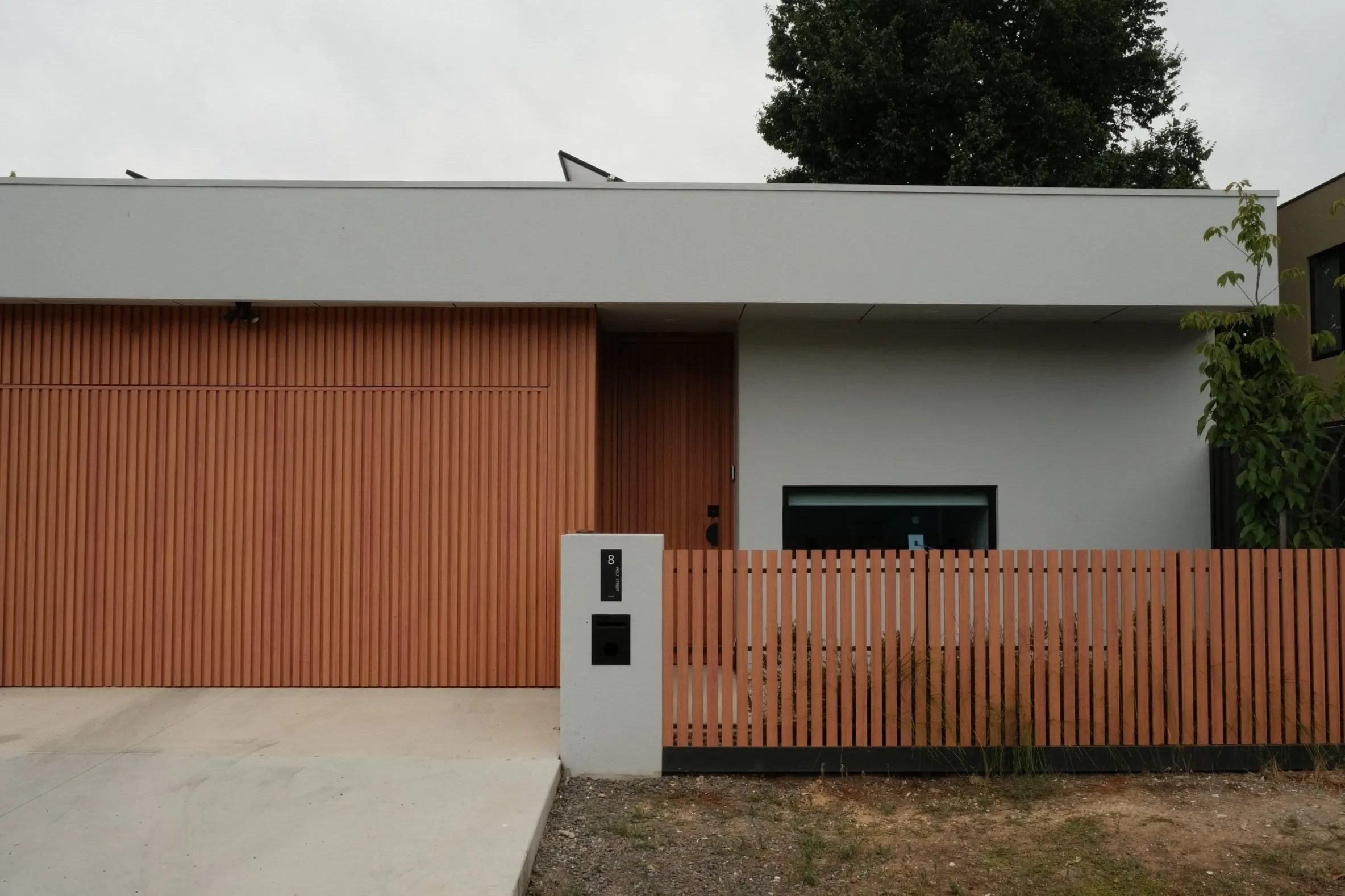 Custom+seamless+garage+door+on+unit.webp