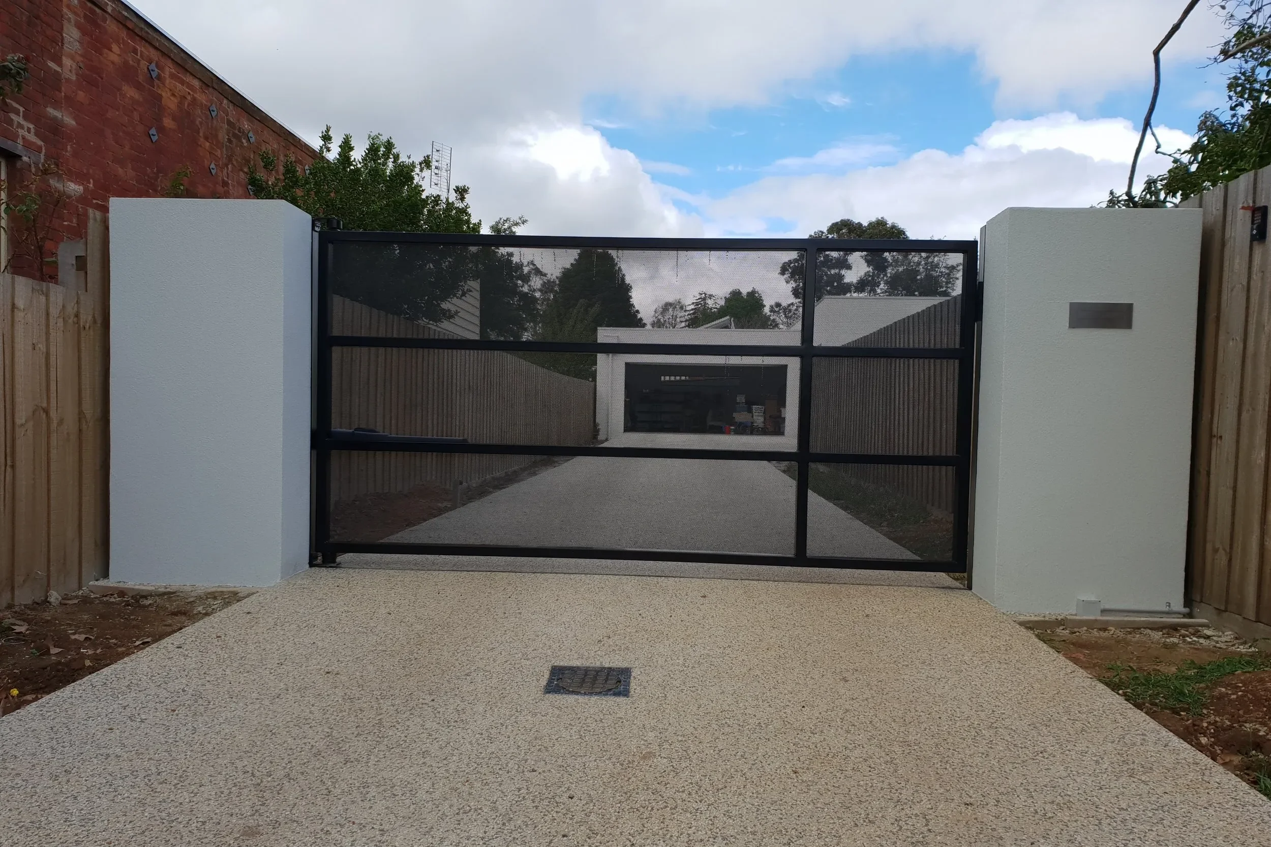 Black metal single swing gate