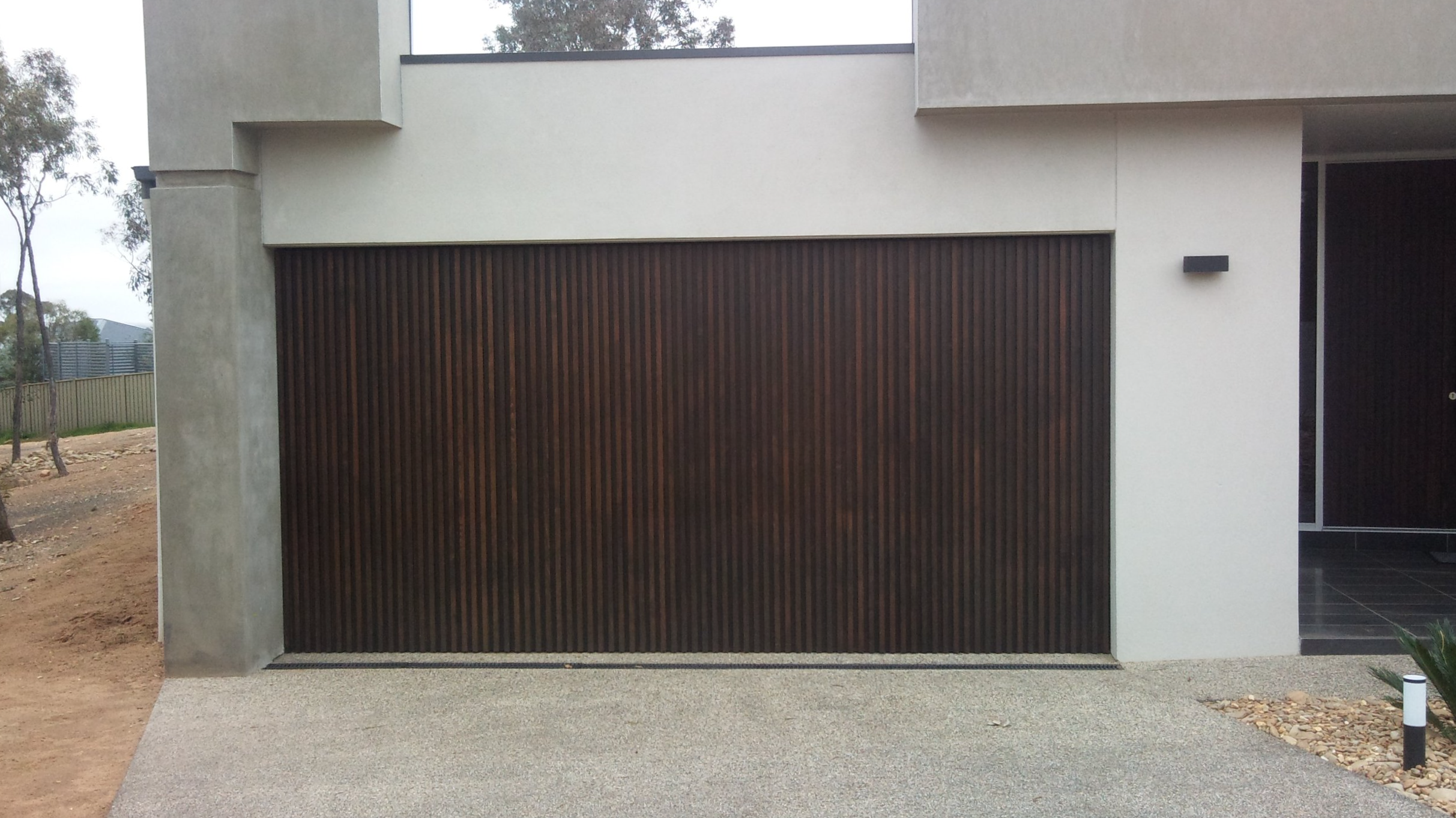 Dark timber custom garage door