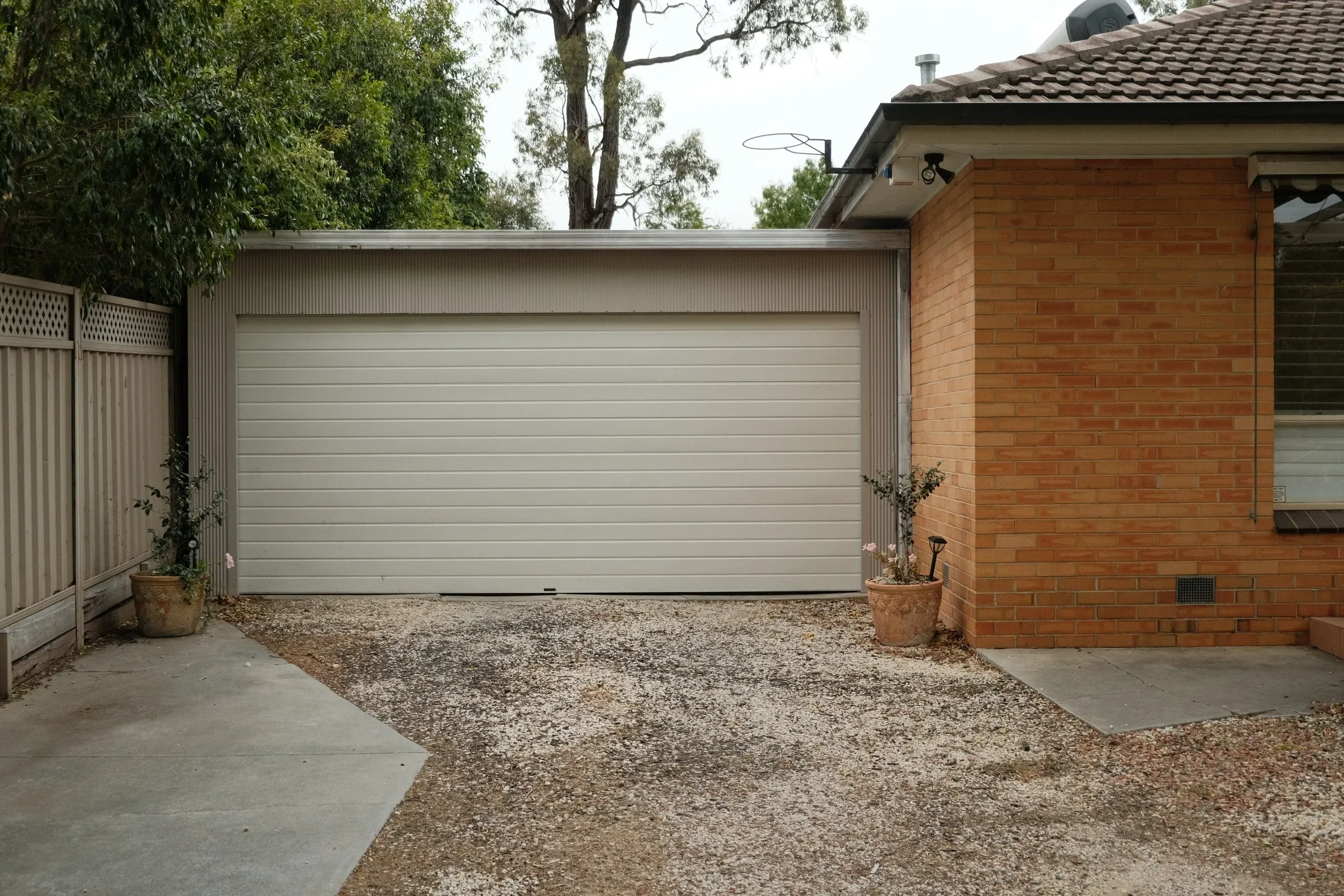 Carport transformed to garage door