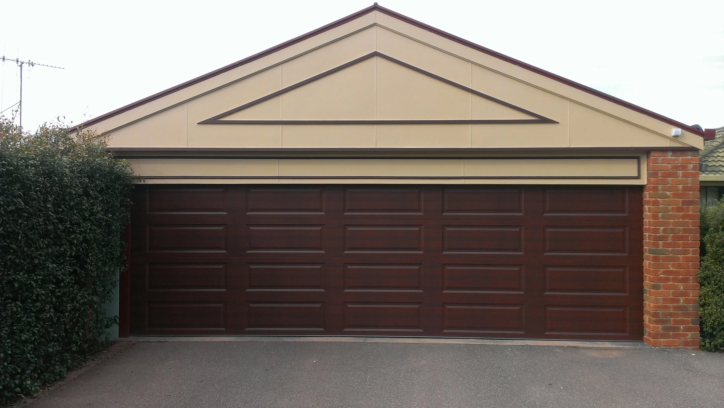 Sectional door brown on home.jpg